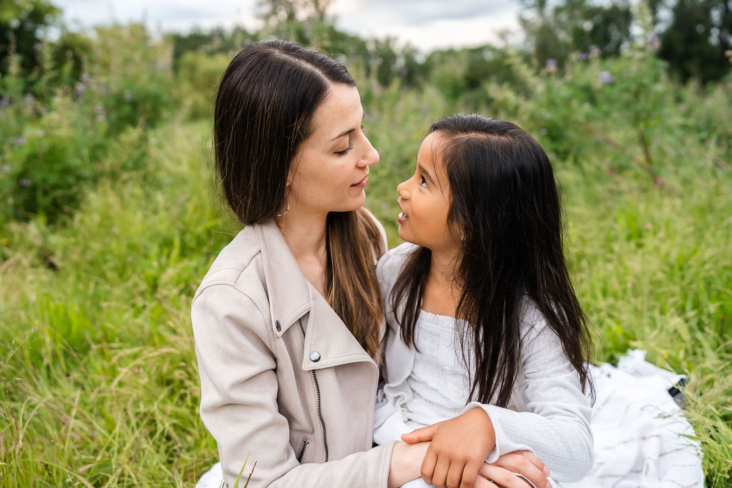 Mother listening to daughter's story at Juanita Bay Park