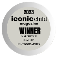 A circular black and white award badge for 2023 Iconic Child Magazine Winner in the Feature Photographer category.