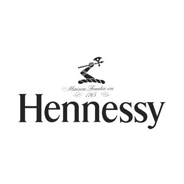 Hennessy cognac brand logo with iconic running man symbol above text.