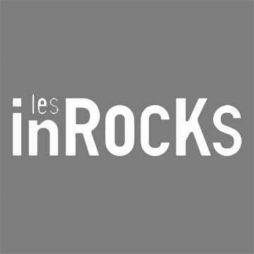 Les Inrocks magazine logo featuring stylized black and white text on grey background.