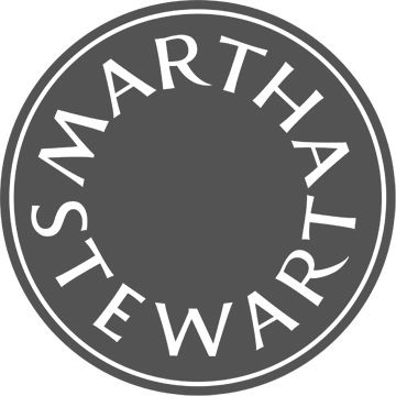 Martha Stewart circular logo design in grey and white.