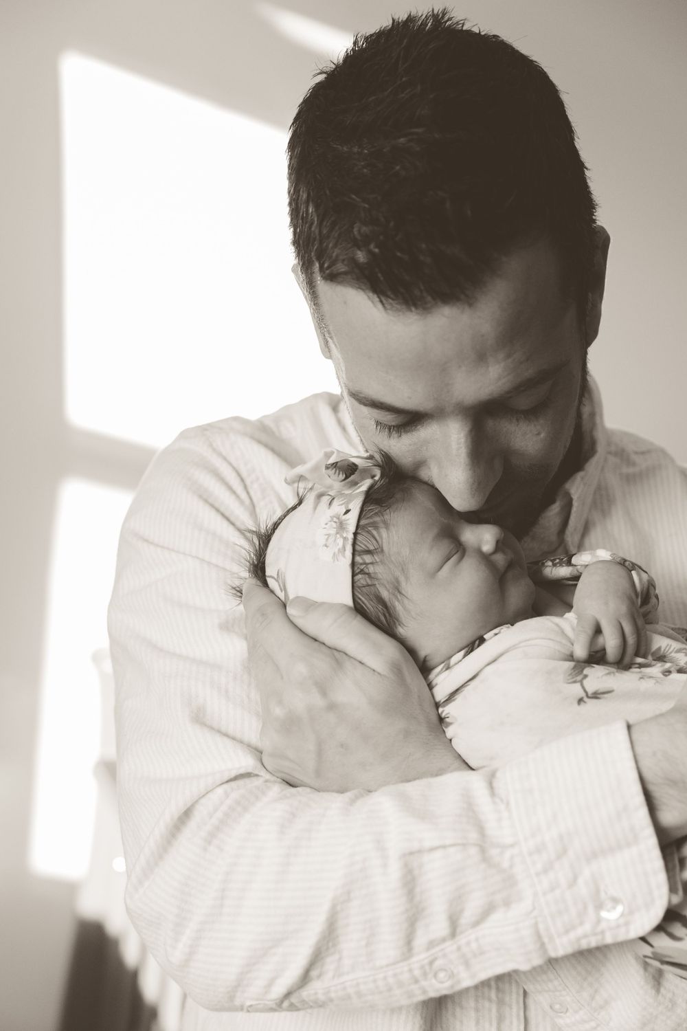 Father and newborn photo shoot