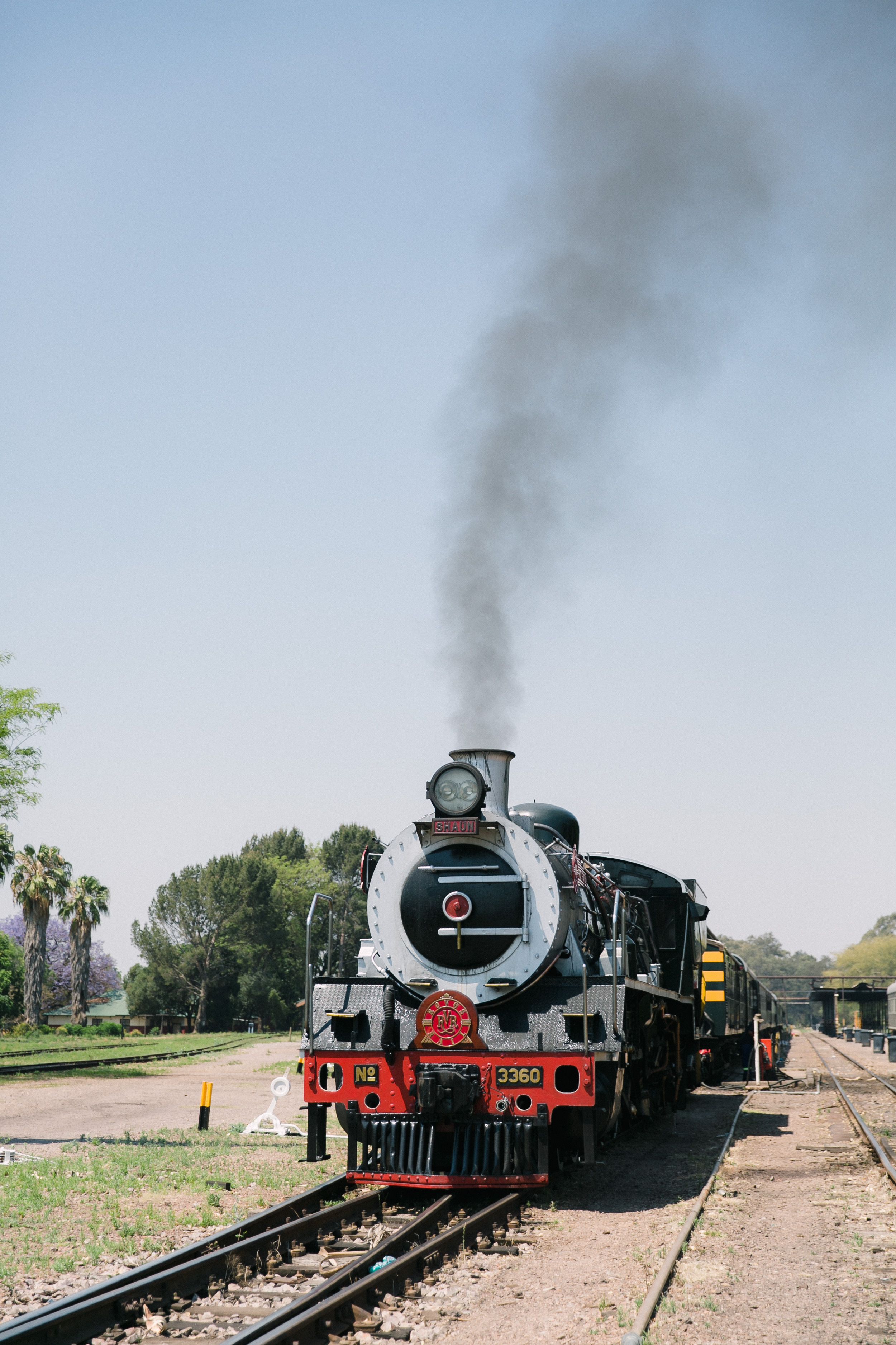 A Rovos Rail steam locomotive departs from the station in Pretoria.