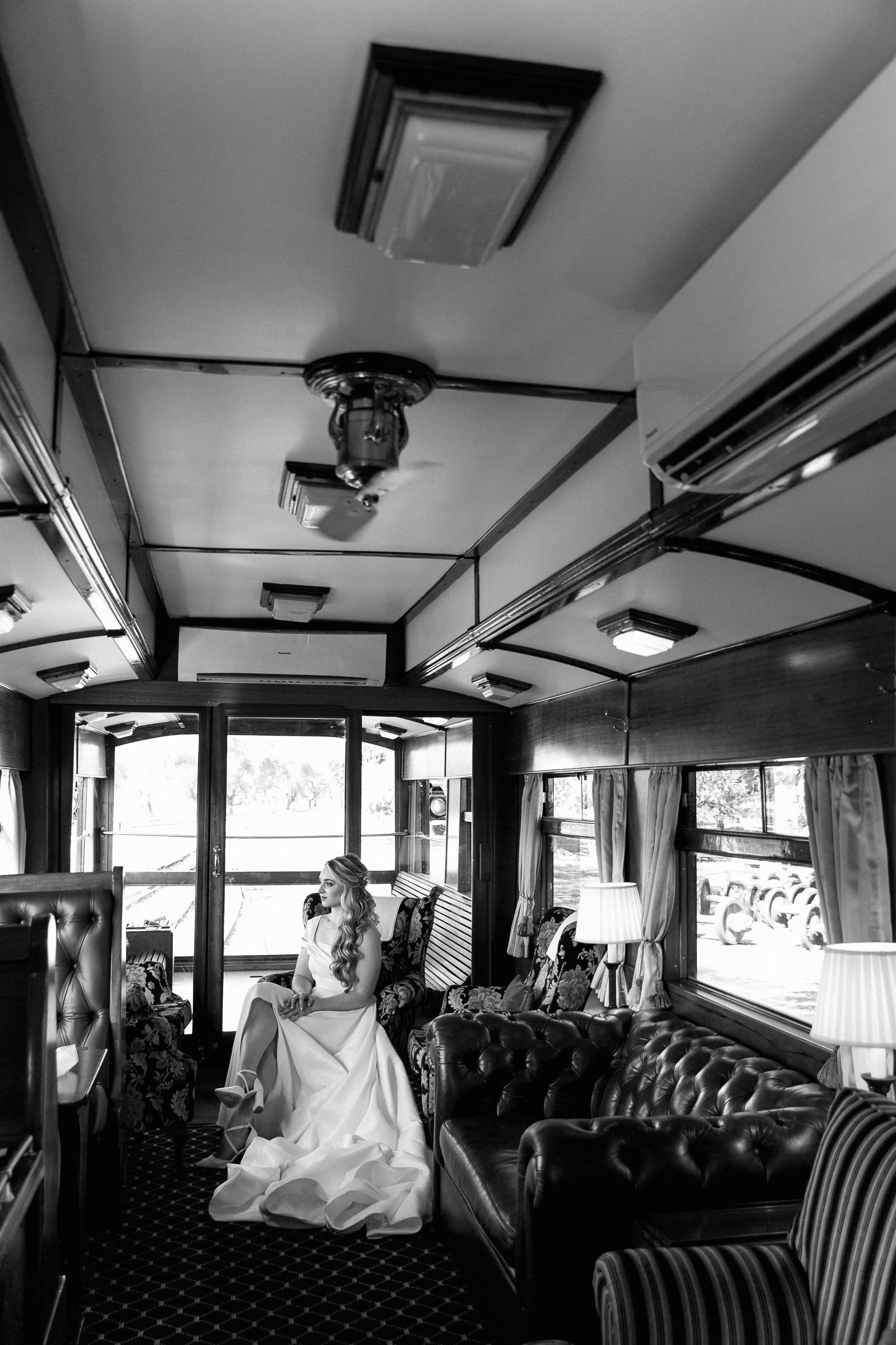 A bride getting ready abroad the legendary Rovos Rail train in South Africa.