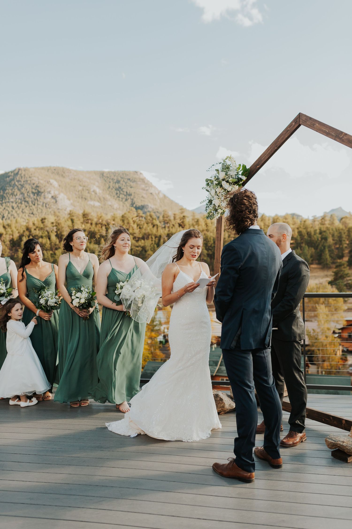 Bride reading vows at Estes Park, Colorado wedding