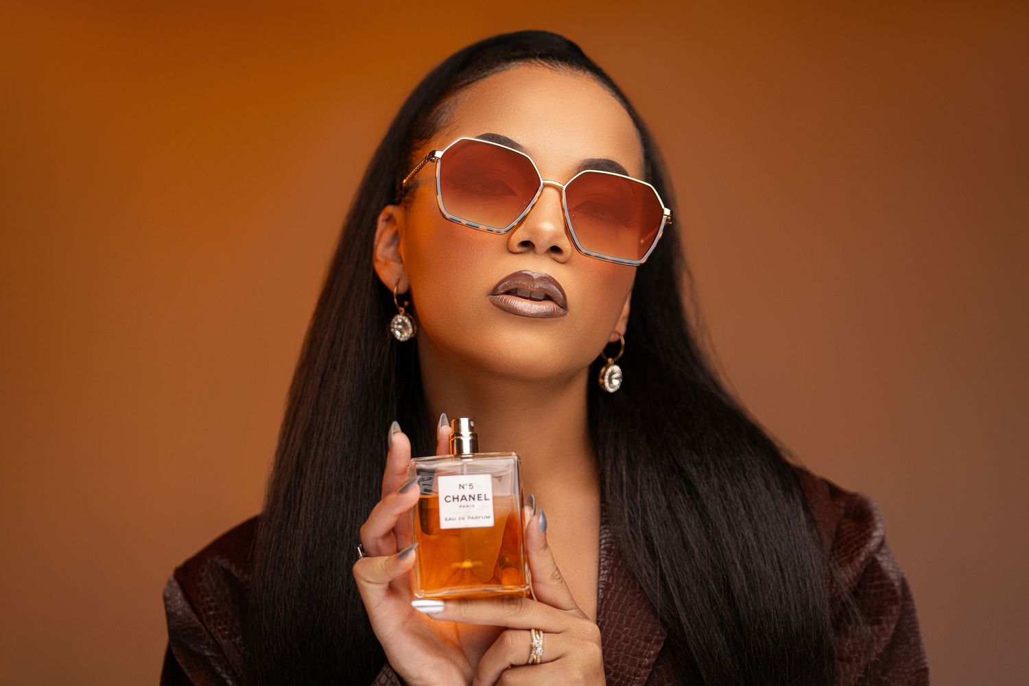 Orlando portrait photographer Ray Alvarez — lifestyle glamour portrait with warm studio tones and commercial editorial styling