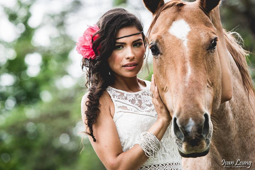 Portrait of Gladys Orozco with a horse for a vintage photoshoot