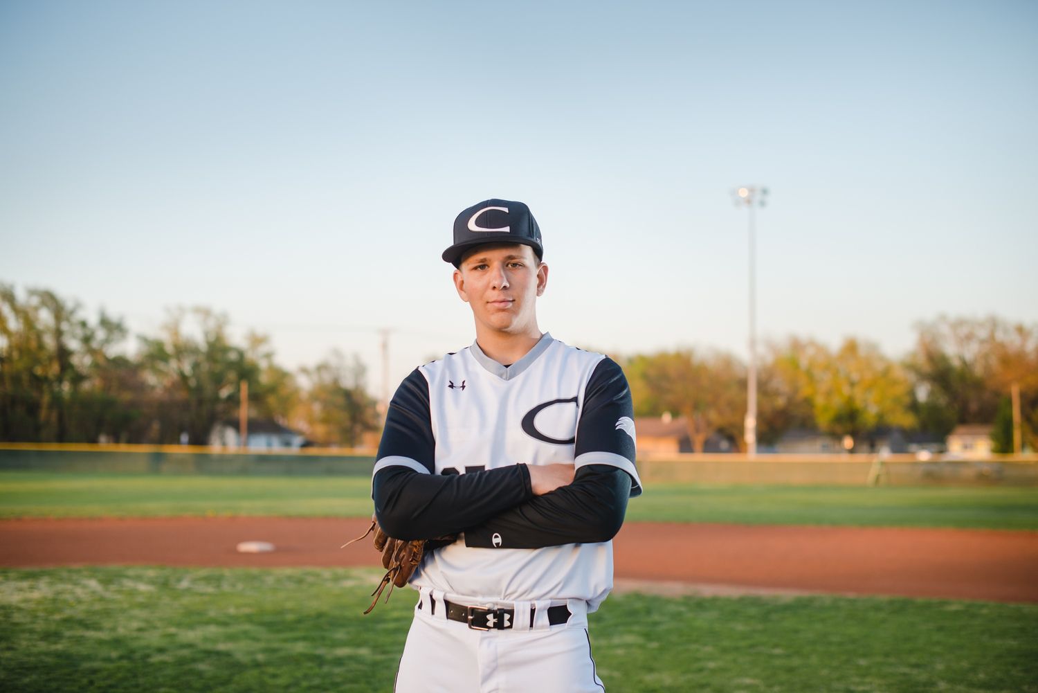 Campus Haysville high school senior pictures at baseball field - Derby, Wichita, KS photographer