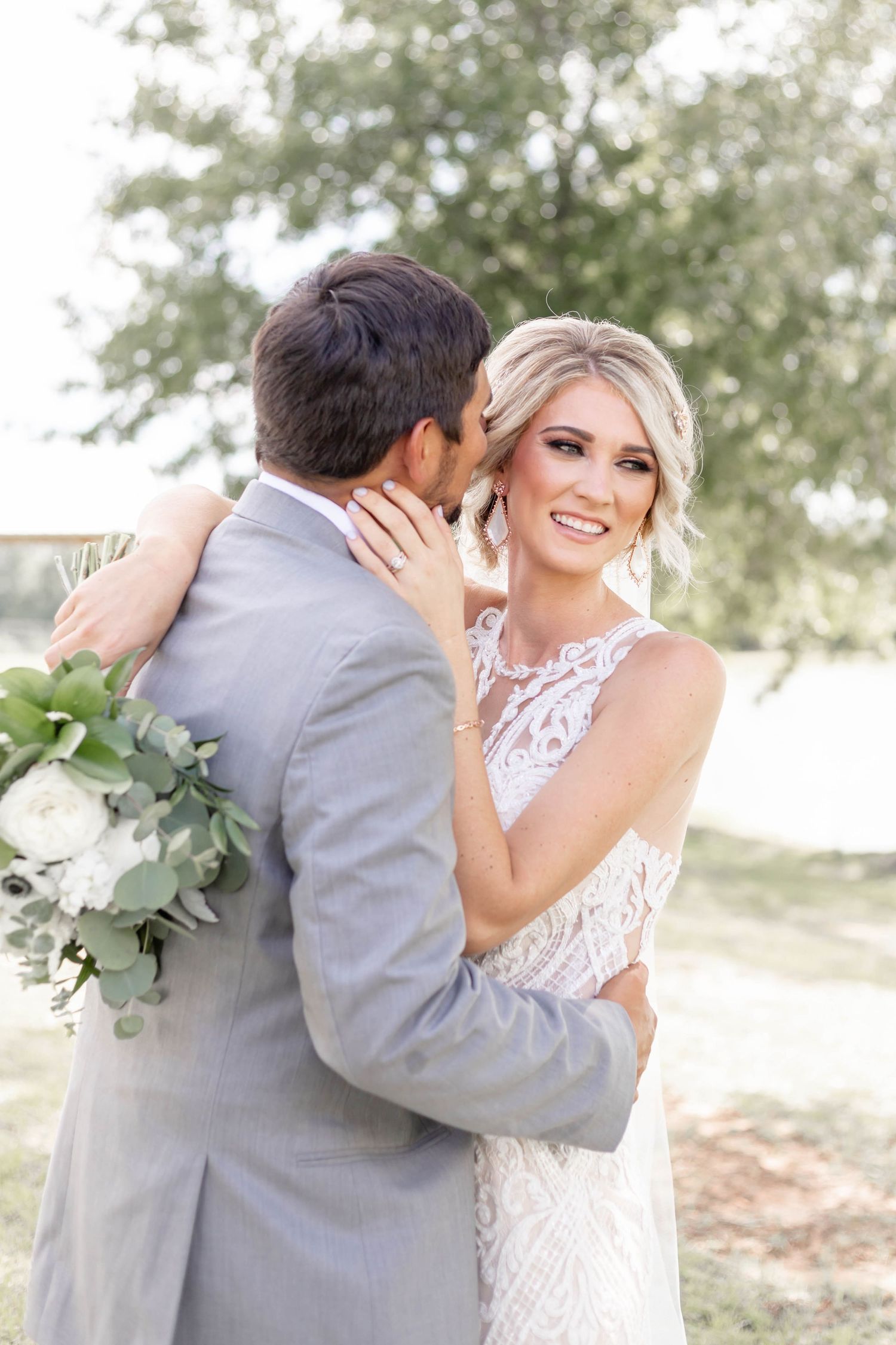 bride and groom nuzzle