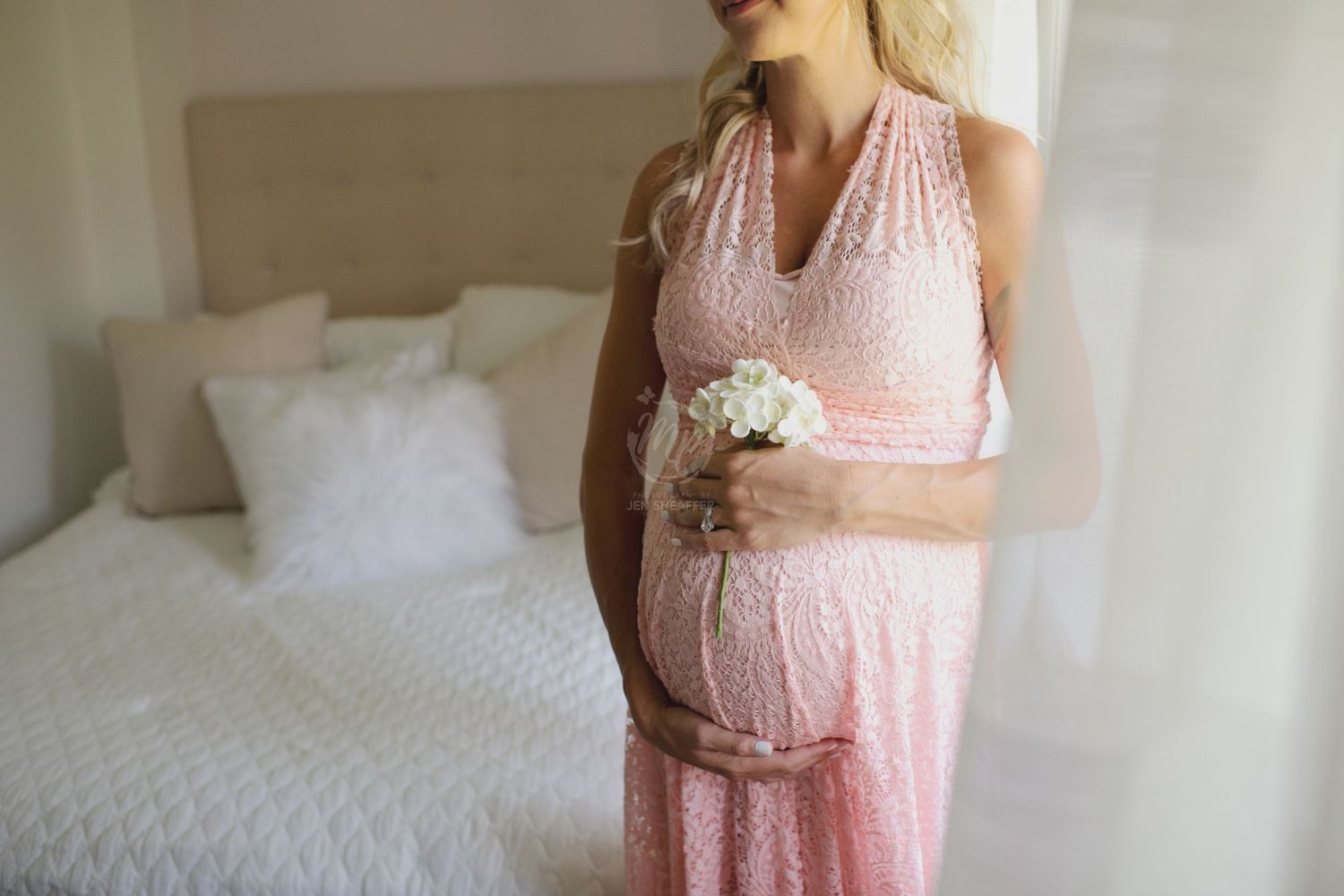 in home maternity session natural light white bedroom