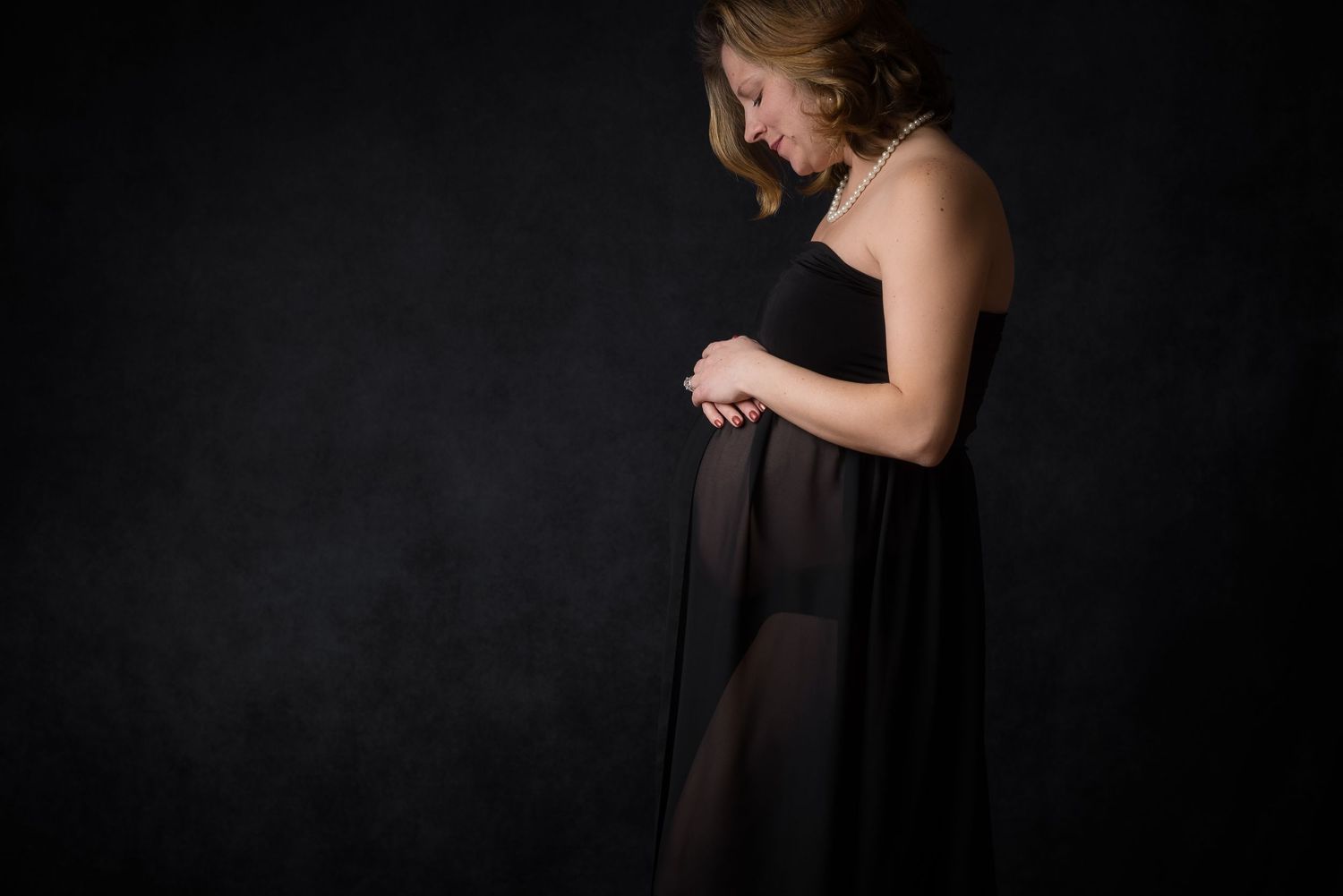 Black and white sheer maternity session studio