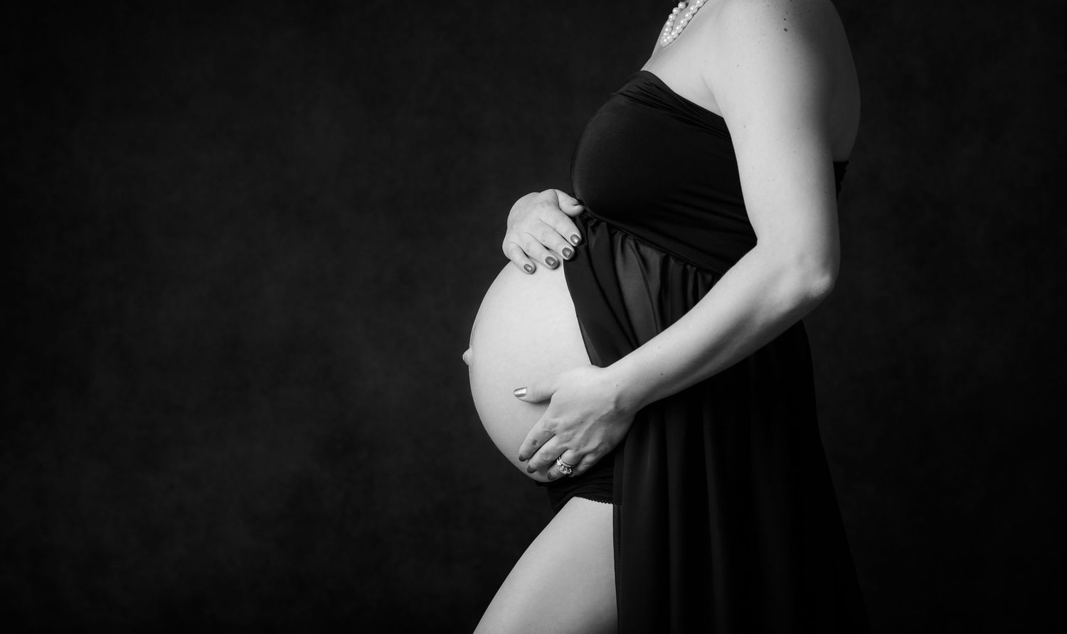 Black and white sheer maternity session studio