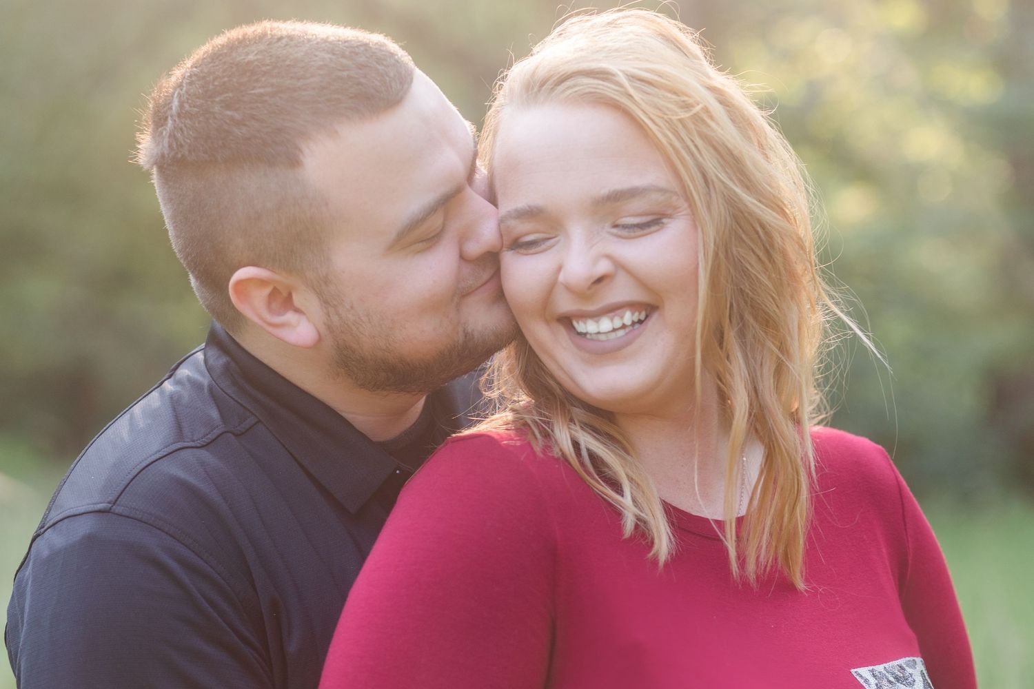 Close-up shots of a couple sharing intimate moments in warm natural lighting.