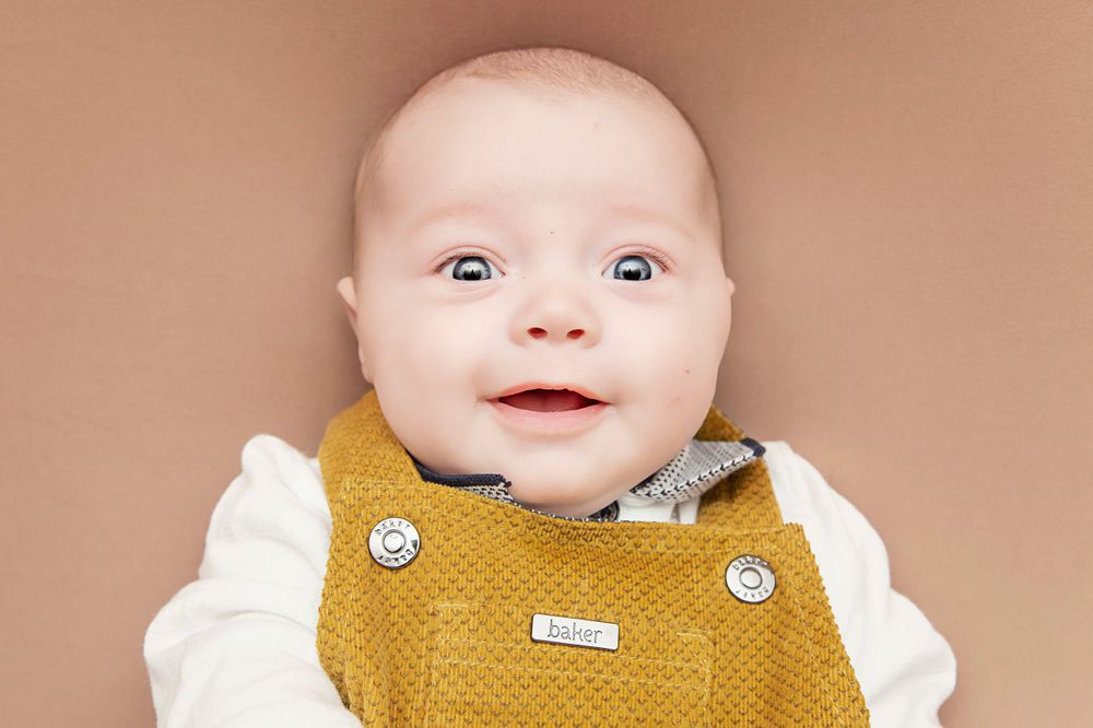 Smiling baby photographer