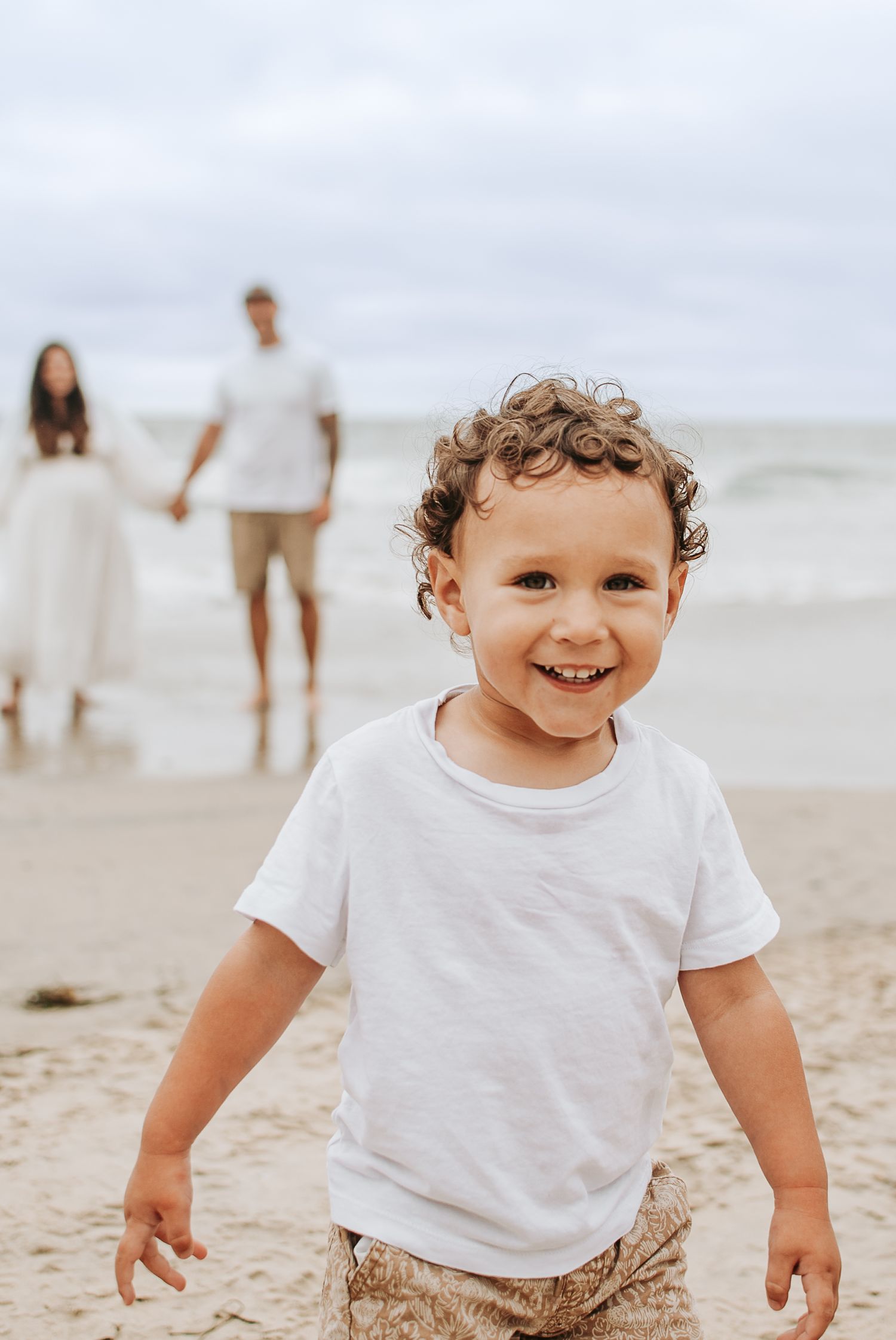 A happy moment on the beach during golden hour.