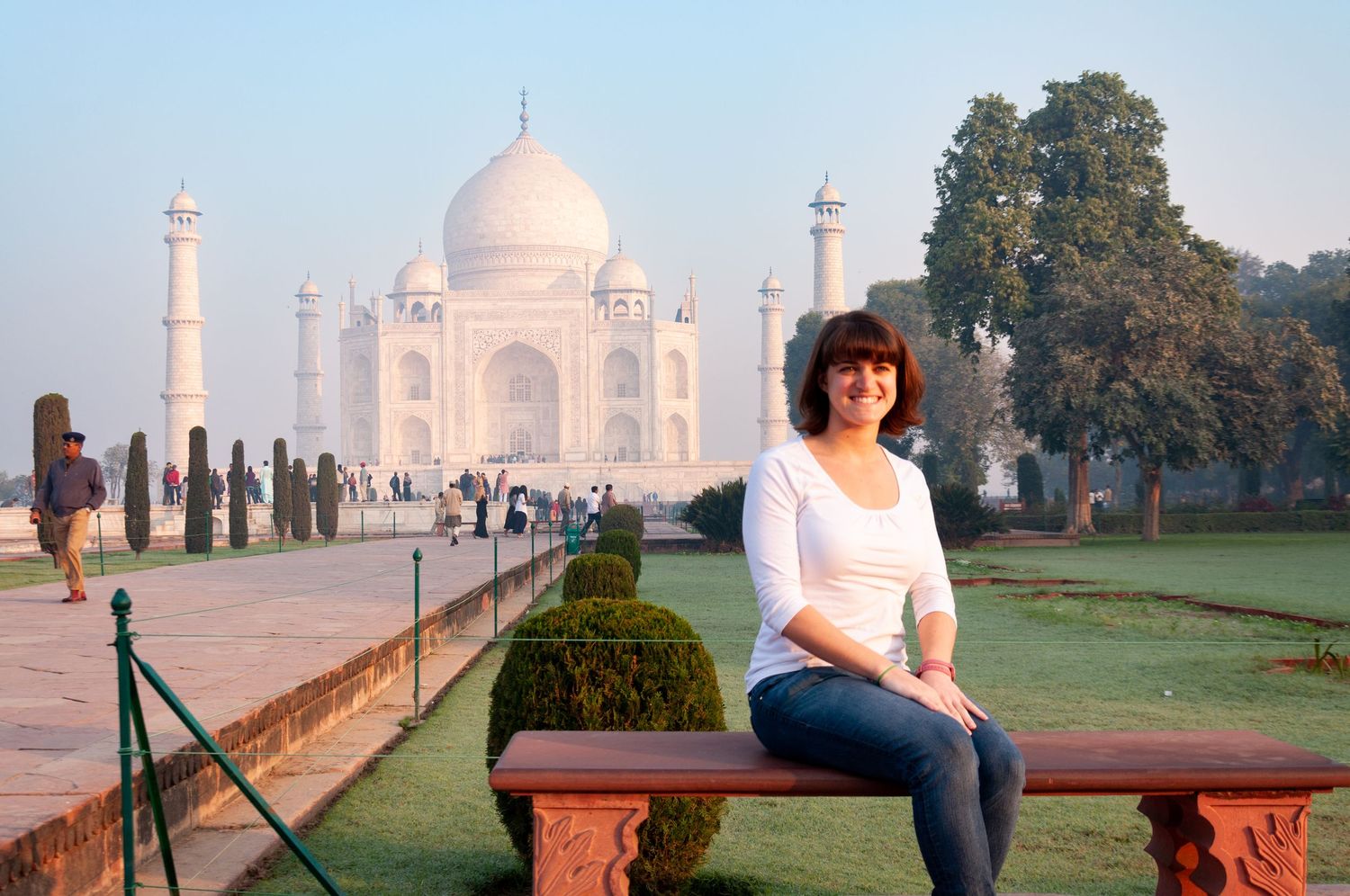 Leah Ramuglia sitting at the Taj Mahal at sunrise in Agra, India.