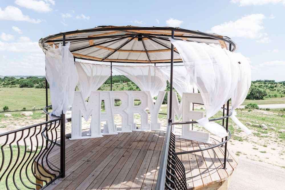 A romantic, surprise proposal at 290 Wine Castle in the Texas hill country.