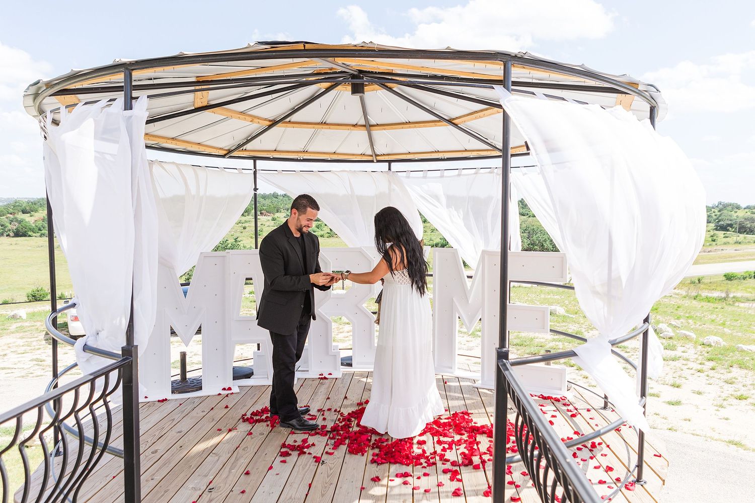 A romantic, surprise proposal at 290 Wine Castle in the Texas hill country.