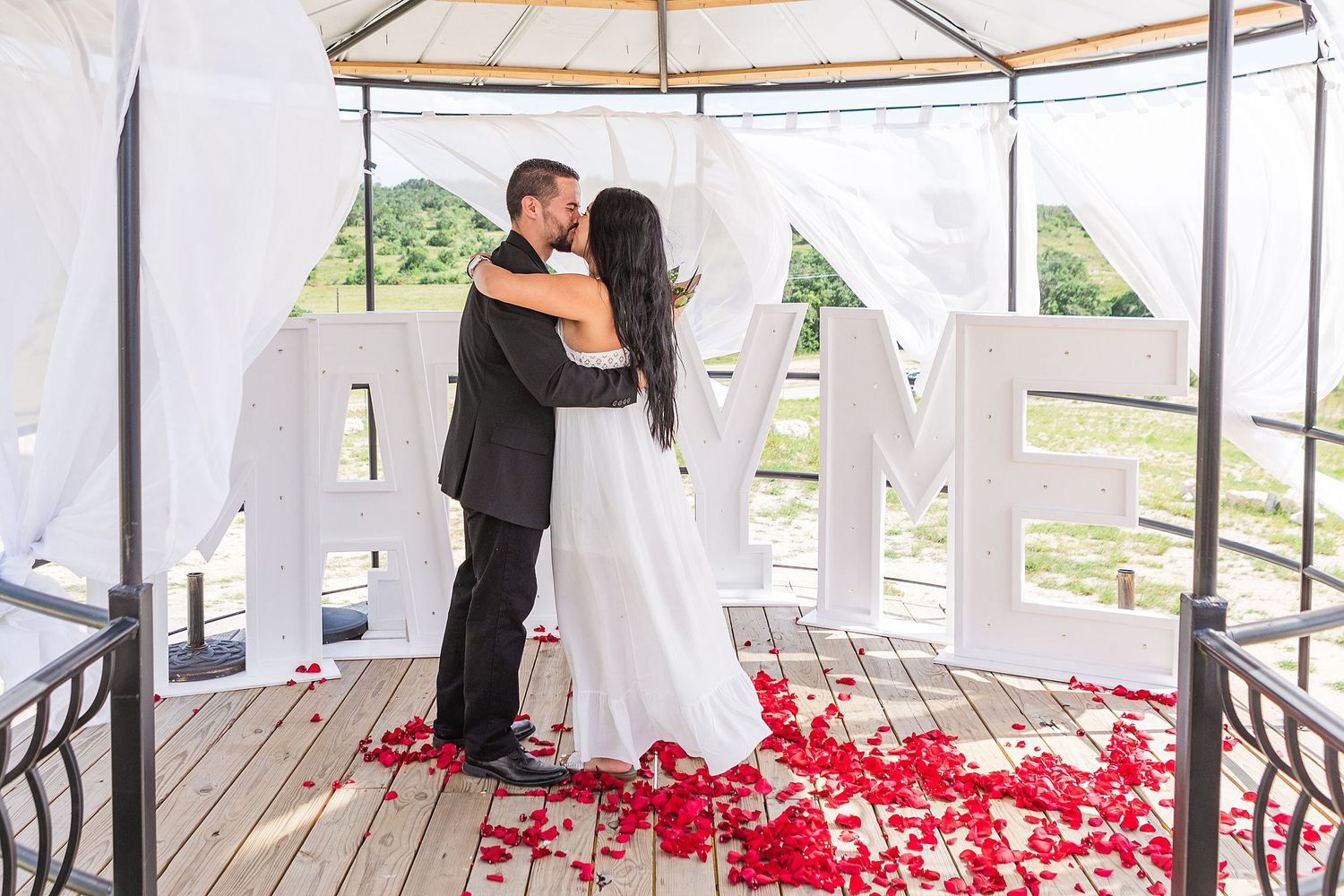 A romantic, surprise proposal at 290 Wine Castle in the Texas hill country.