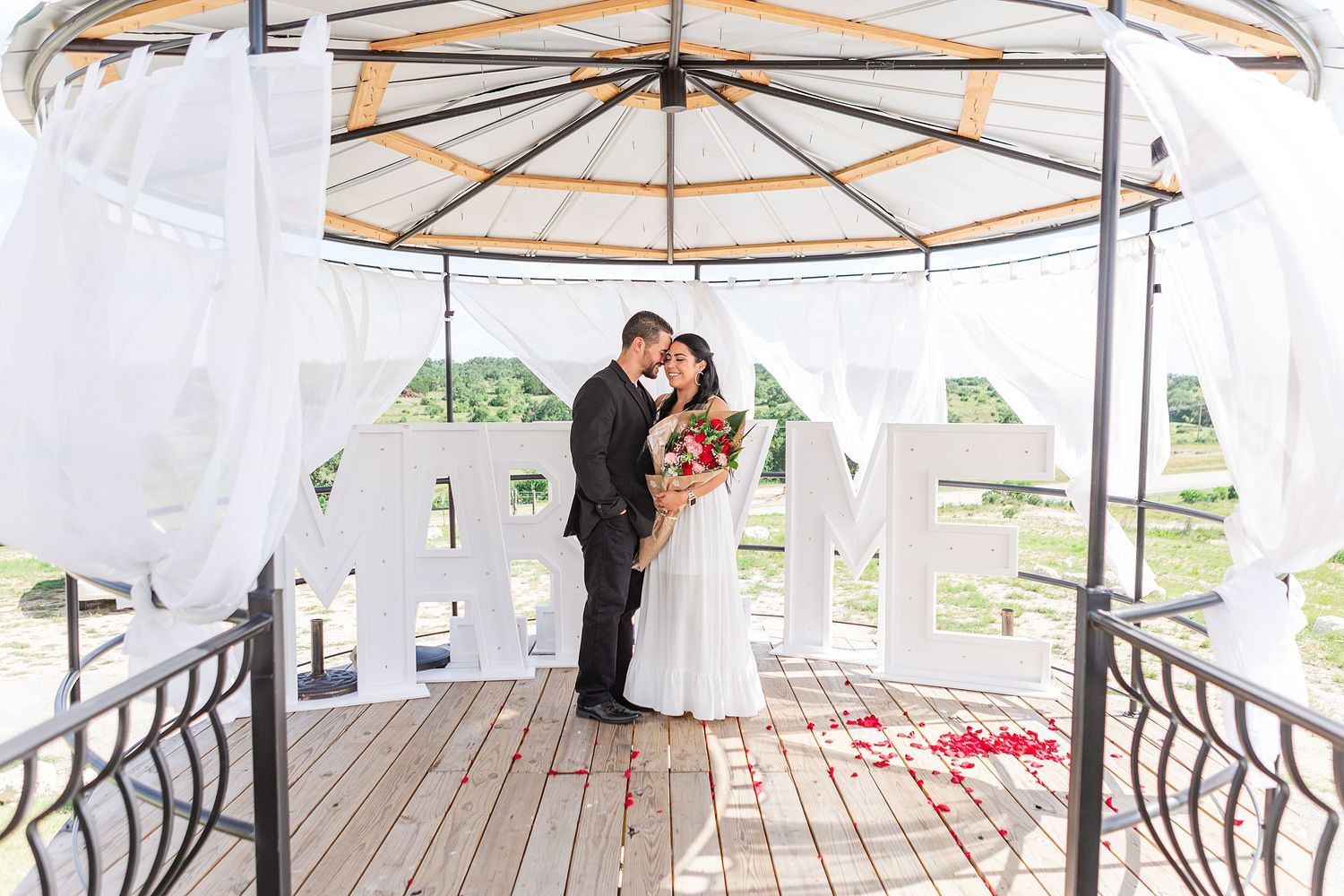 A romantic, surprise proposal at 290 Wine Castle in the Texas hill country.