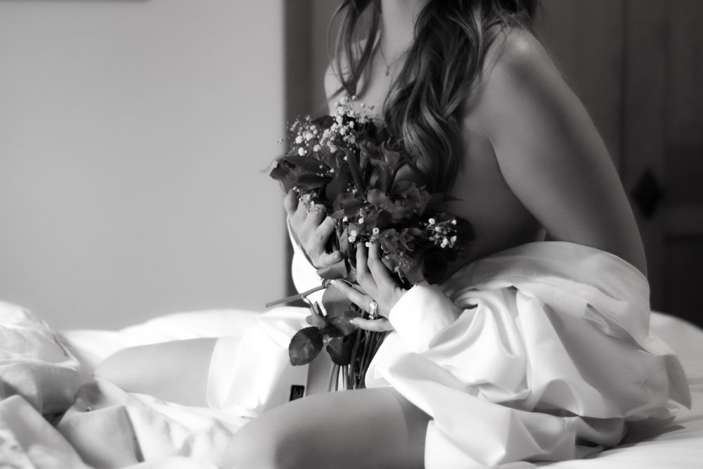 black and white boudoir model dressed in husbands shirt