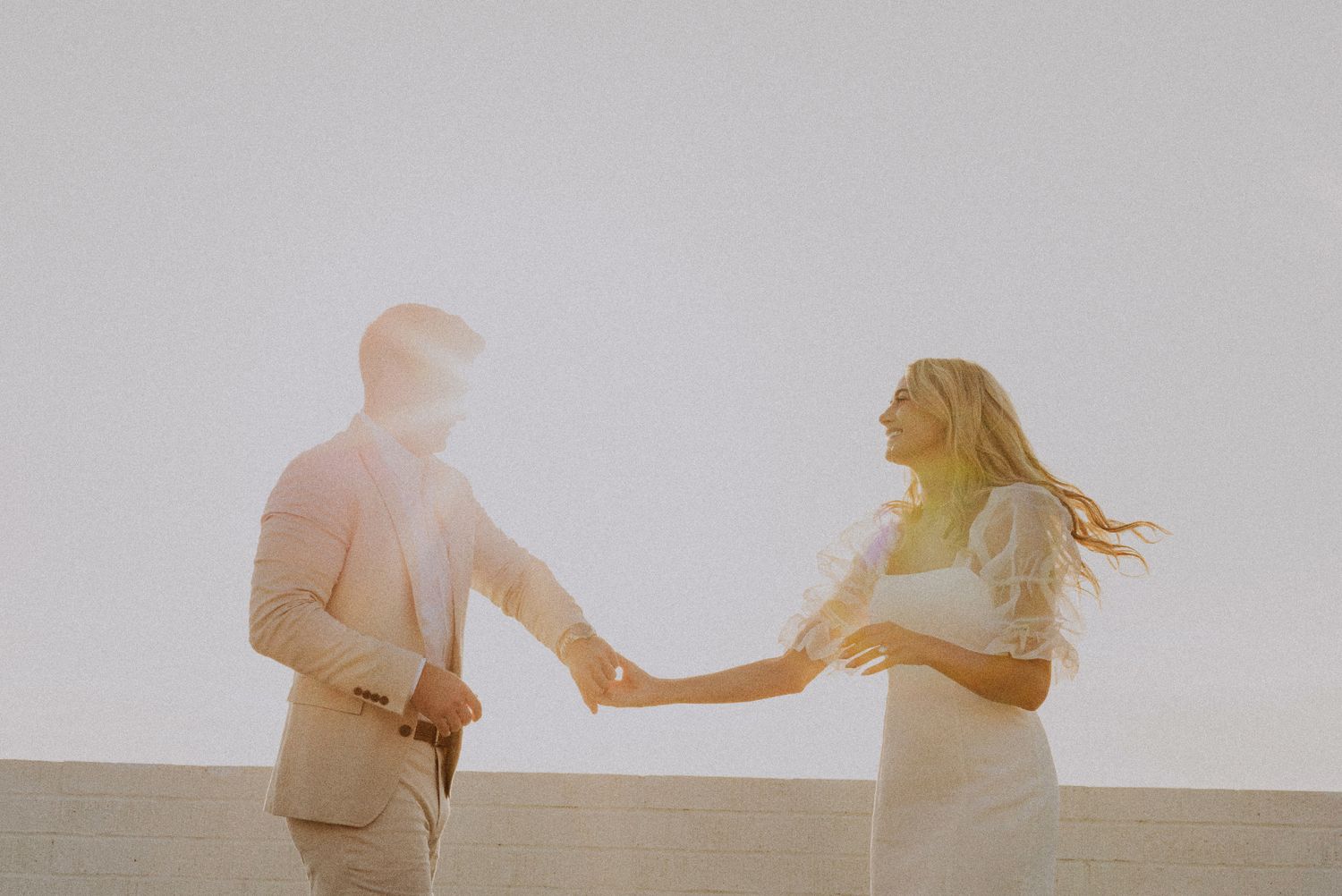 35mm film photo of fun bridal themed engagement shoot on roof of parking structure in Lido Marina, Newport beach