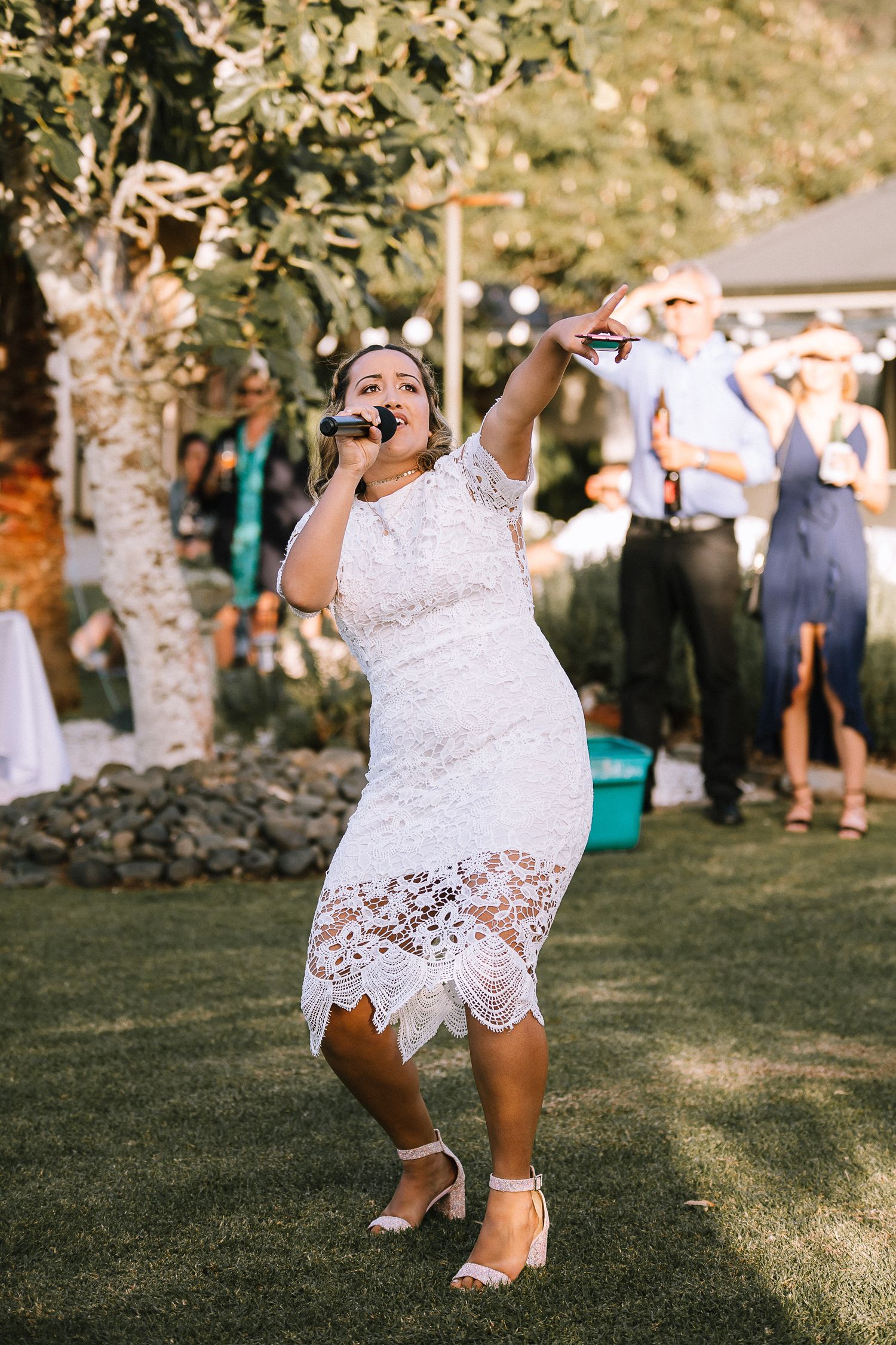 Bridesmaid singing at wedding in Coromandel