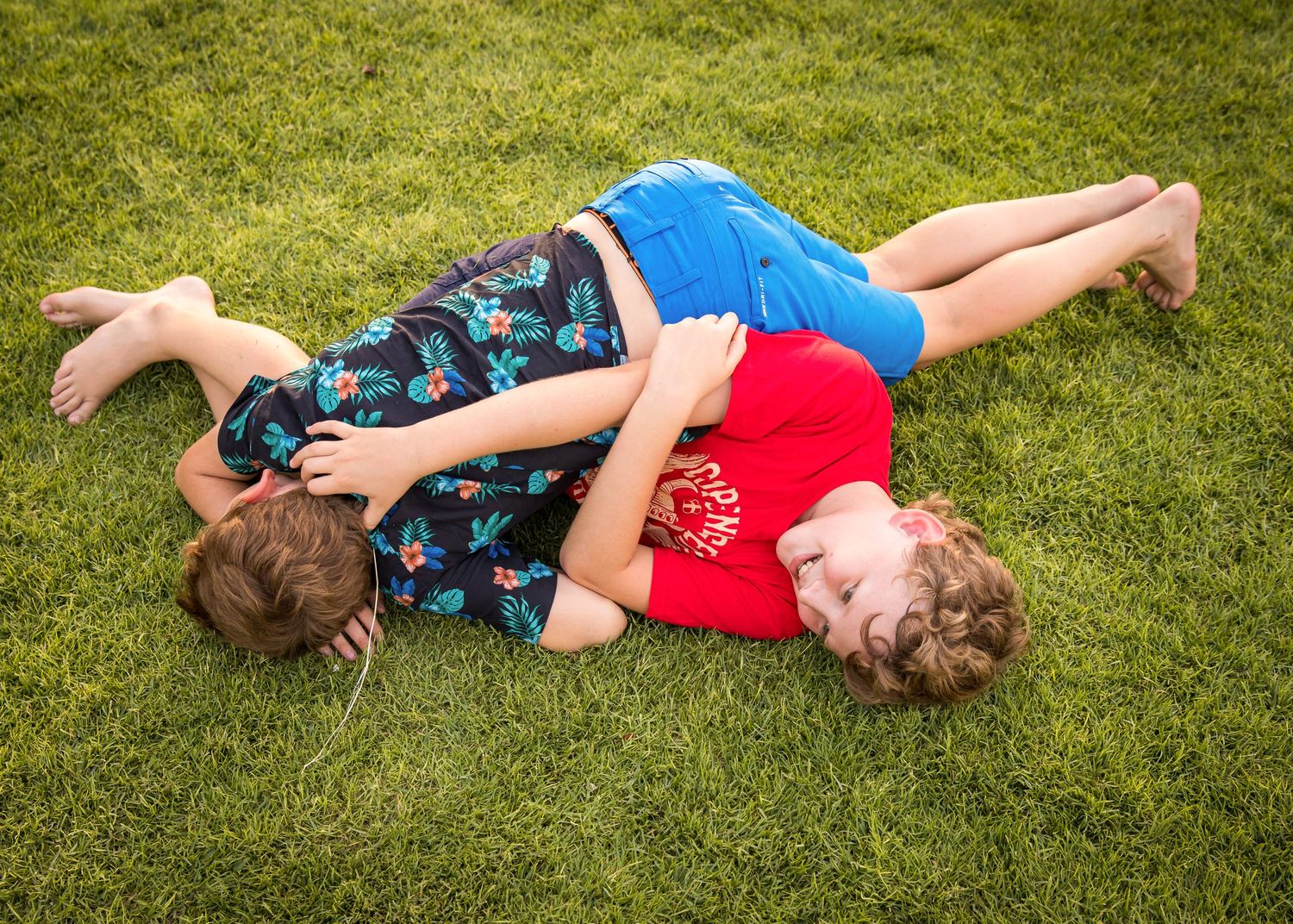 boys playing in park photoshoot