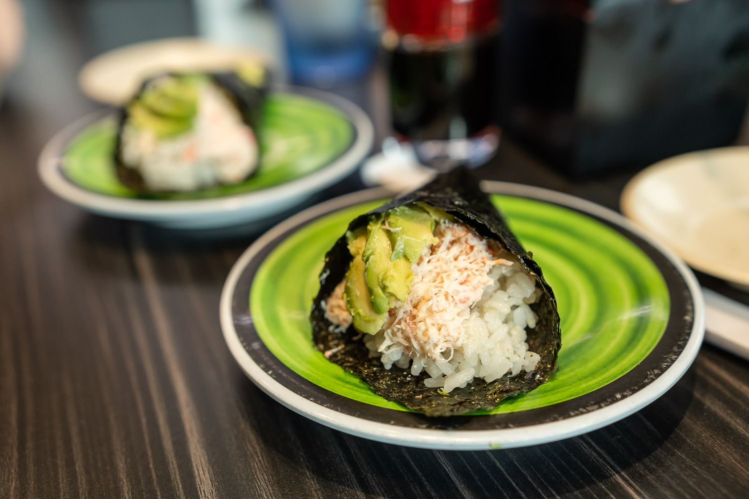 Close up detailed photo of real crab California roll at a sushi restaurant in Bellevue.