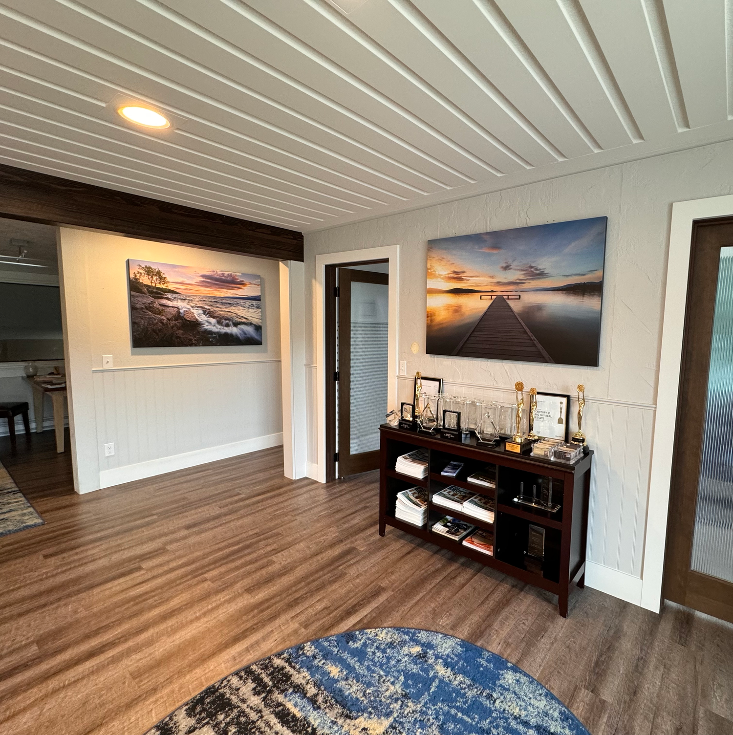 Large canvas fine art prints on display in an office