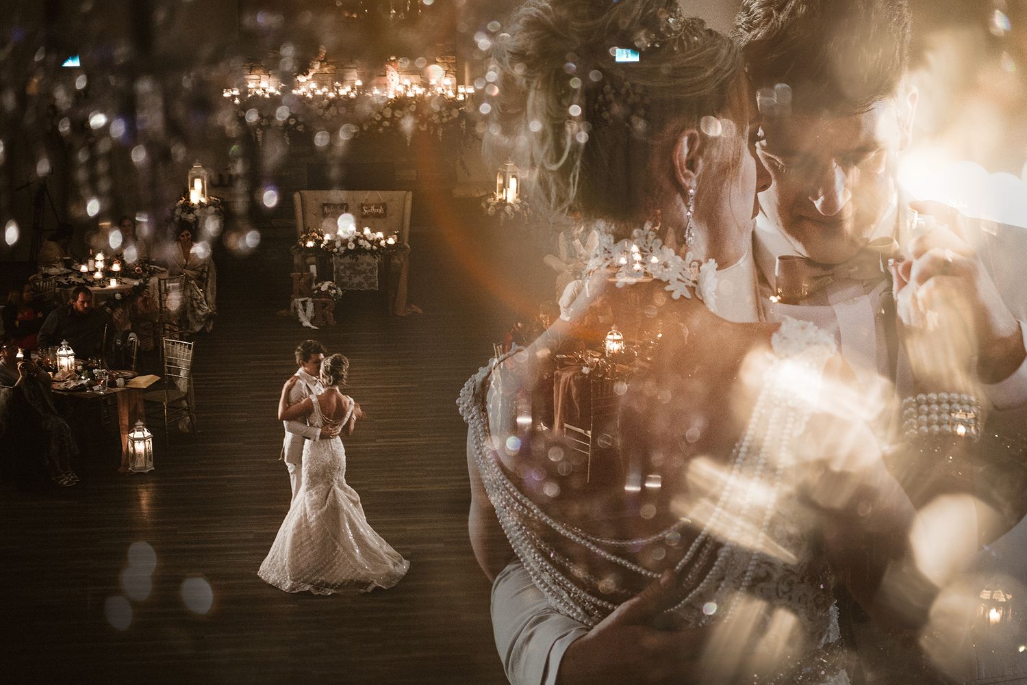 Artistic wedding reception dance photo with dreamy bokeh light effects.