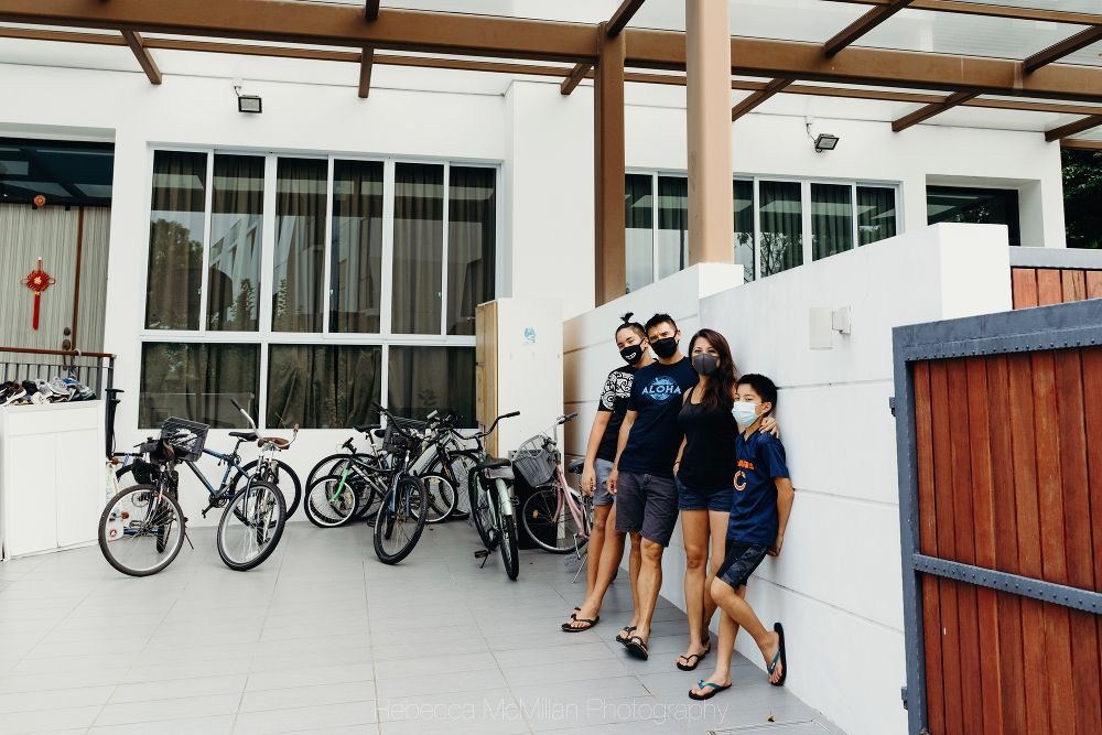 A family photograph outside their condo in Sembawang