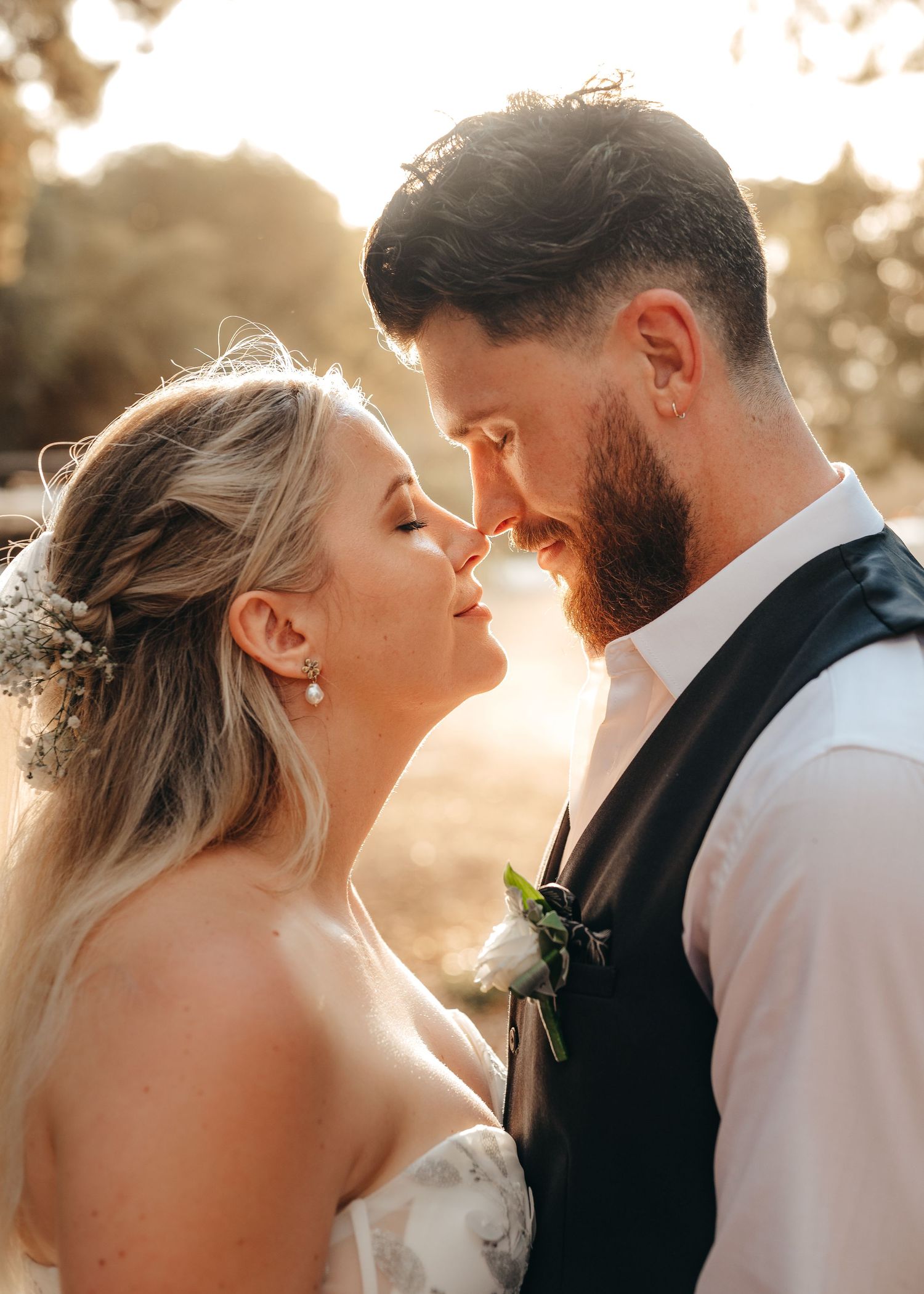 A beautiful moment from this wedding at Rainbow Beach, Queensland with Nicole Bailey Photography