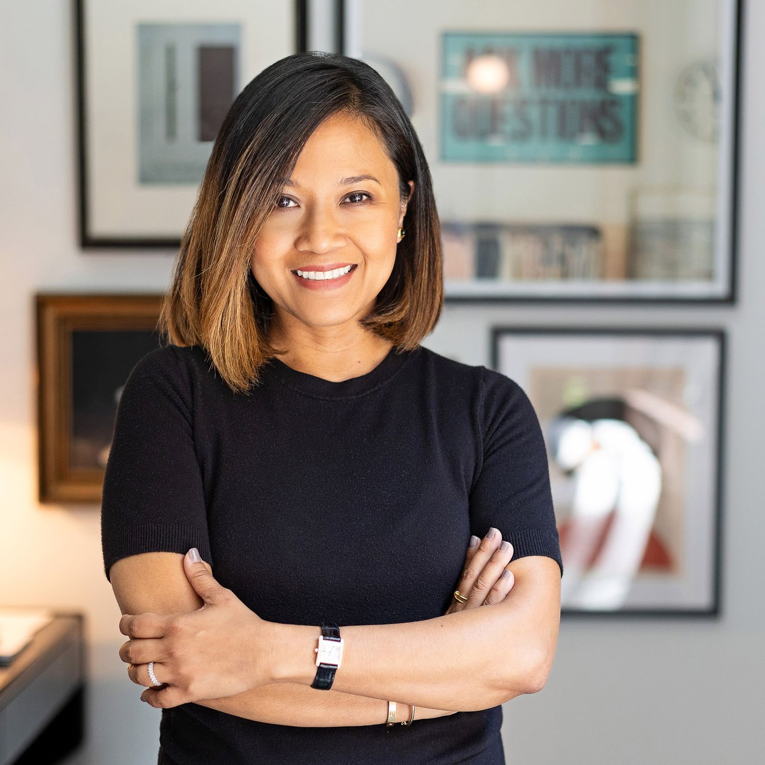Portrait series of a person in black sweater against neutral background showing warm expressions.