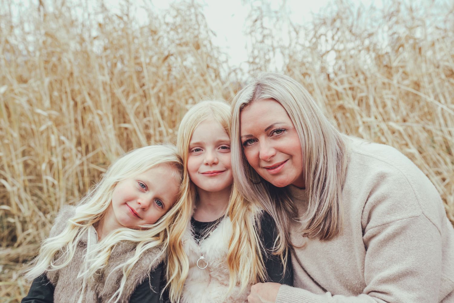 Photoshoot of mom and 2 daughters.