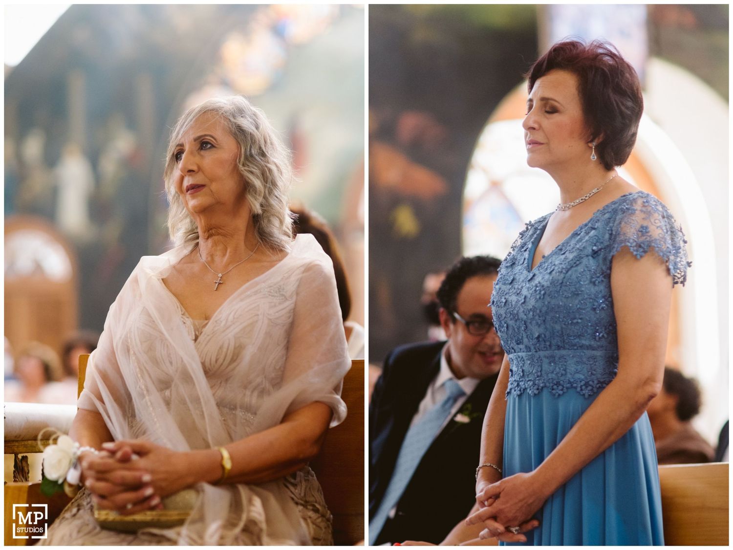 Two guests in formal attire during an elegant church wedding ceremony.