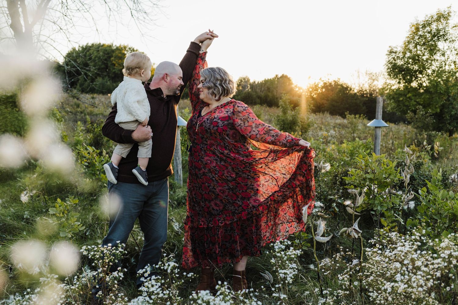 Photo of family with golden hour in background by pewaukee wisconsin photographer.