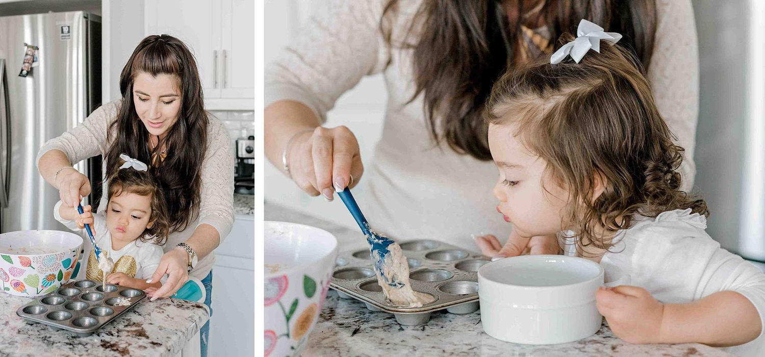 Intimate kitchen scene showing a baking activity with a small child in a bright modern space.