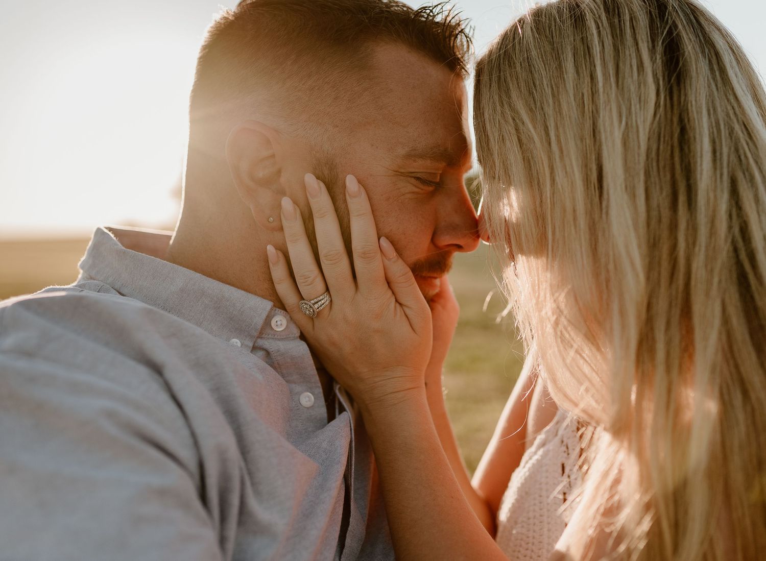 Couple poses for engagement session with connecticut photographer