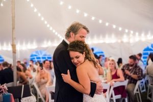 Bride & Dad dancing at reception after her beach wedding at sunset on Panama City Beach