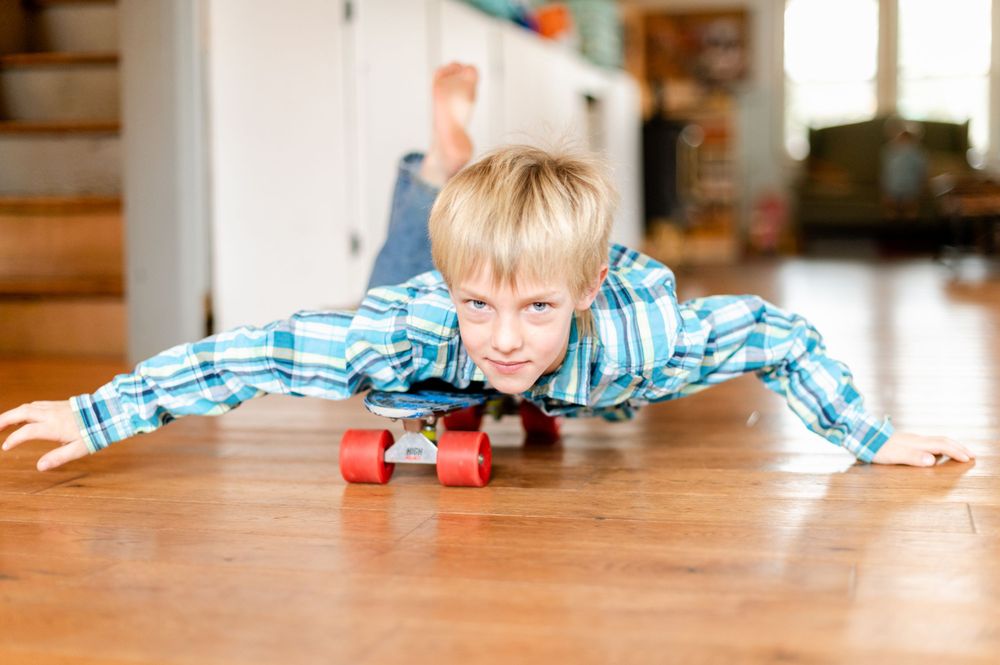 boy on a skateboard in house