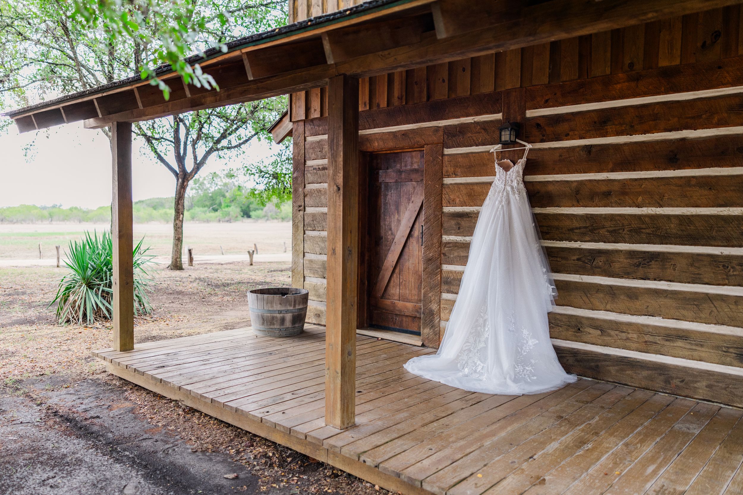 Wedding dress hanging at bridal suite
