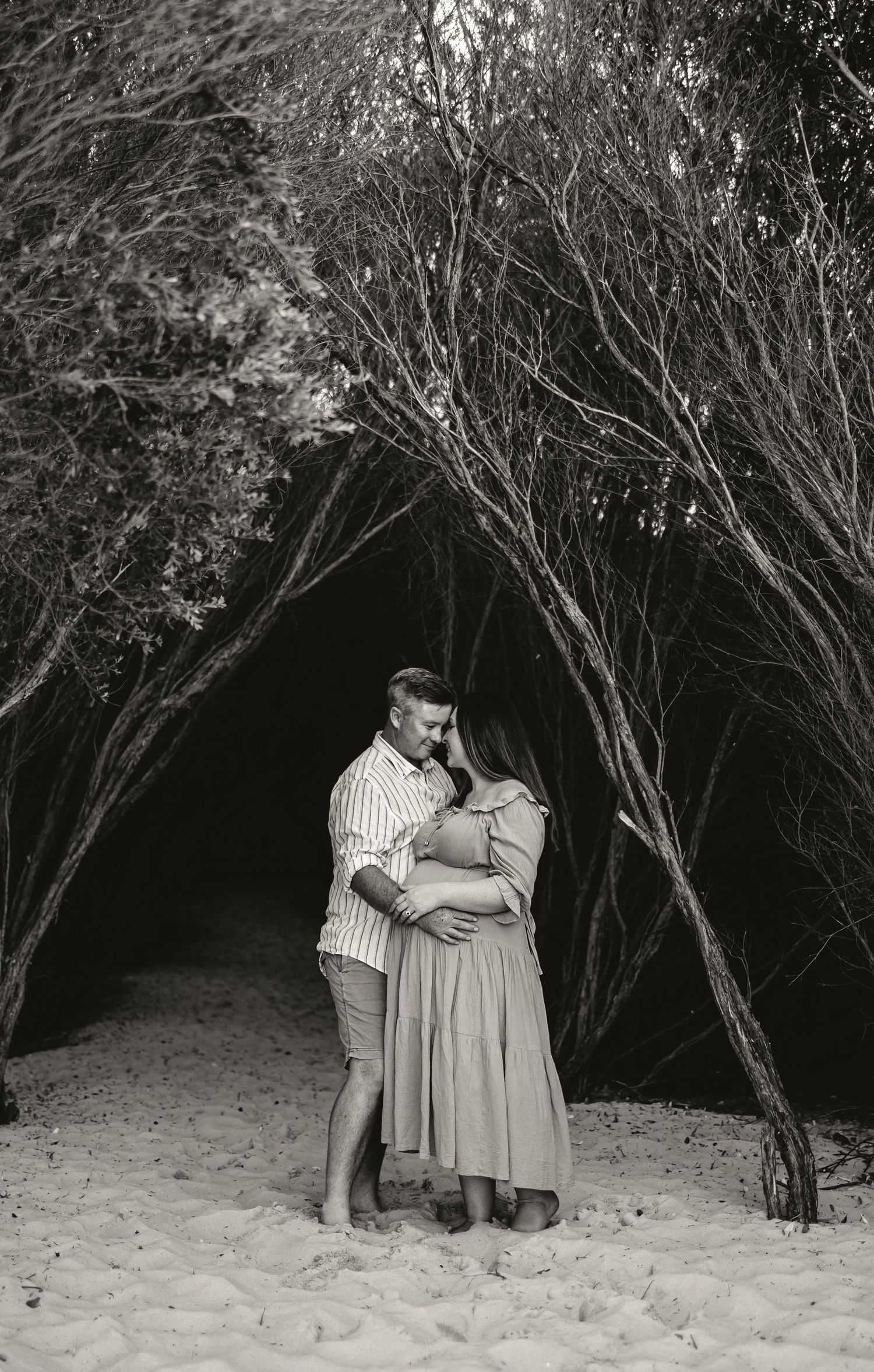 Mum Dad Couple Maternity Photoshoot at sunset on the beach, Lake Macquarie, Newcastle, Hunter Valley