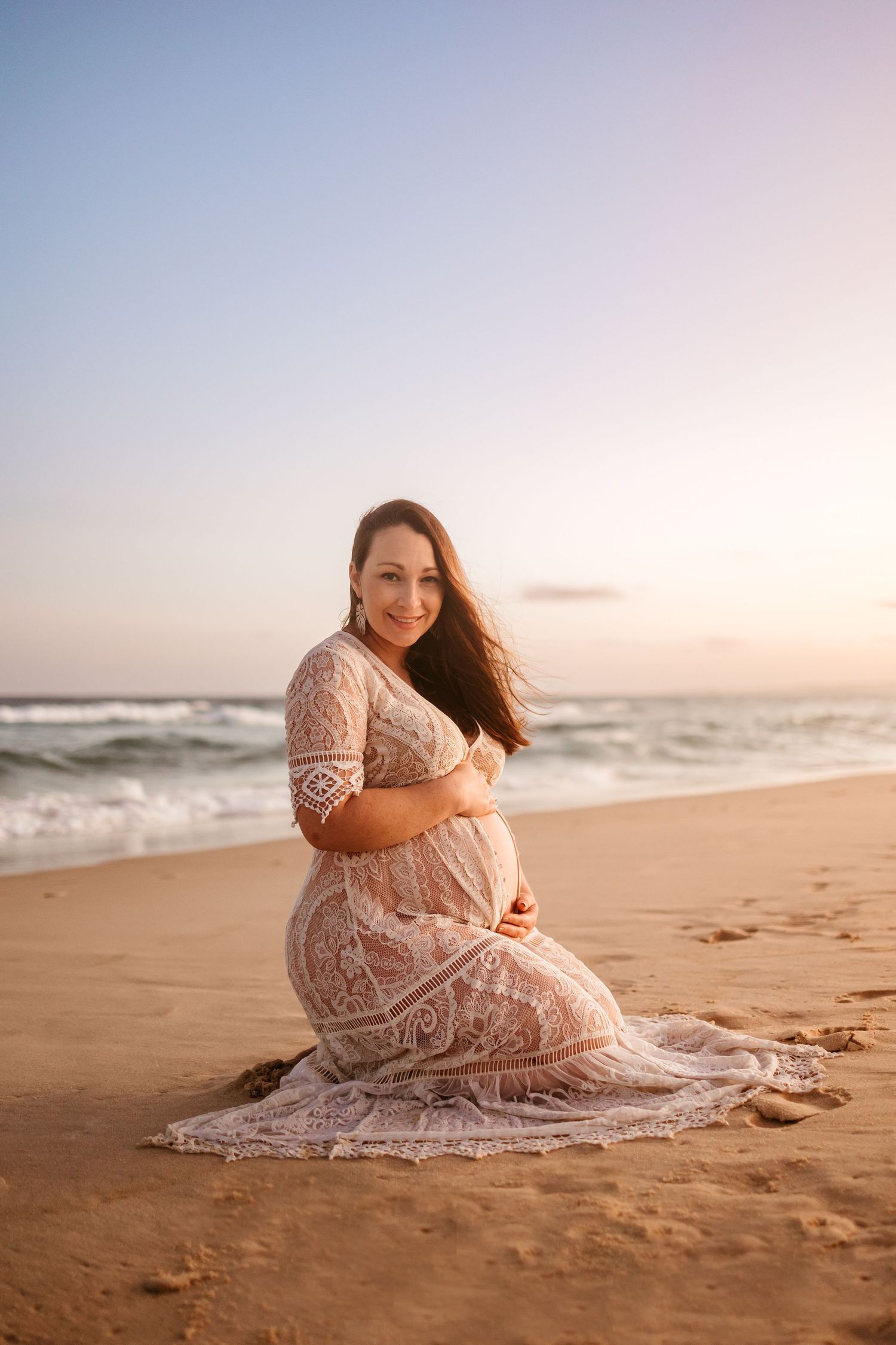 Mum Woman pregnant belly Maternity Photoshoot at sunset on the beach, Lake Macquarie, Newcastle, Hunter Valley