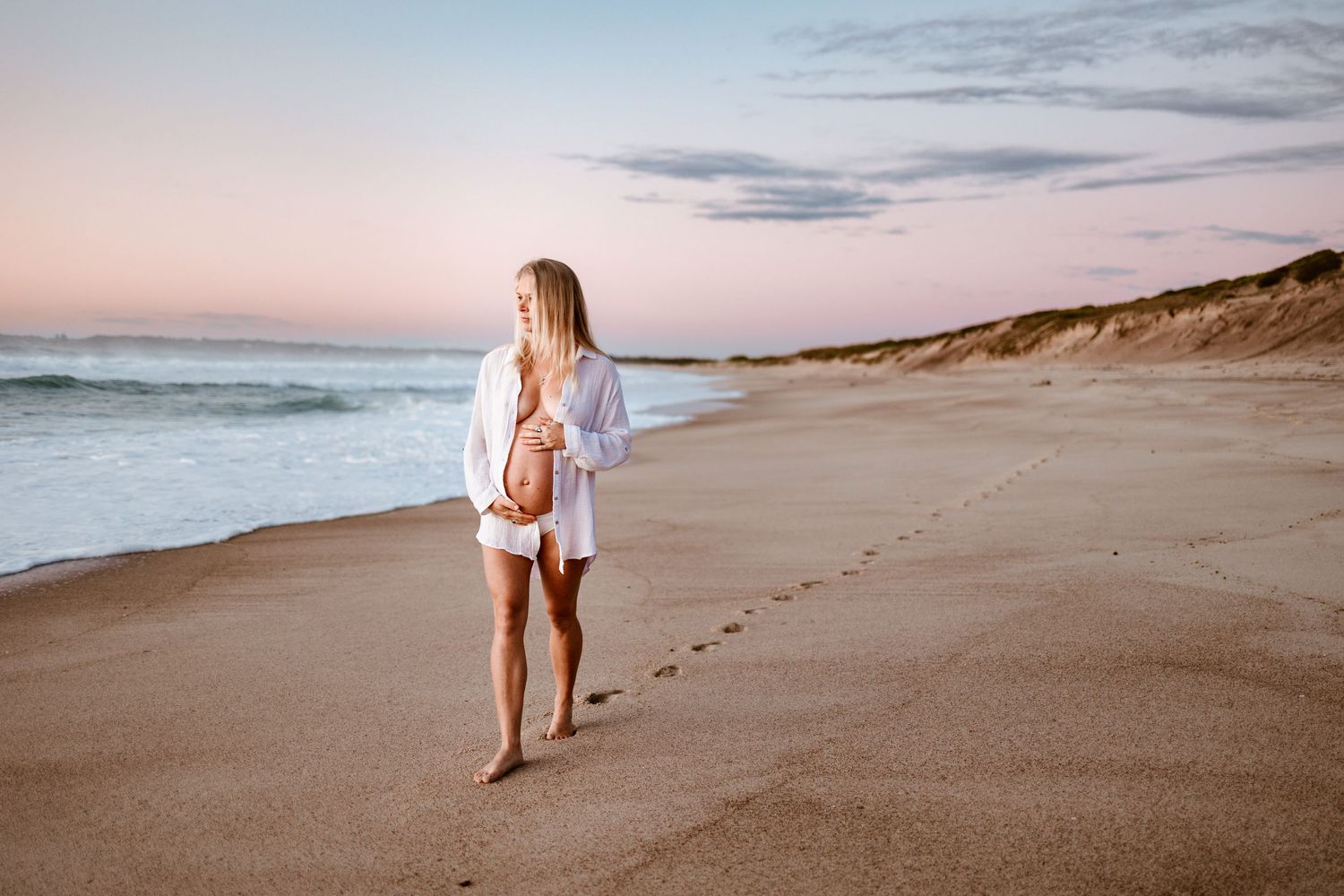 Pregnant Woman Belly Nude Maternity Photoshoot at sunset on the beach, Lake Macquarie, Newcastle