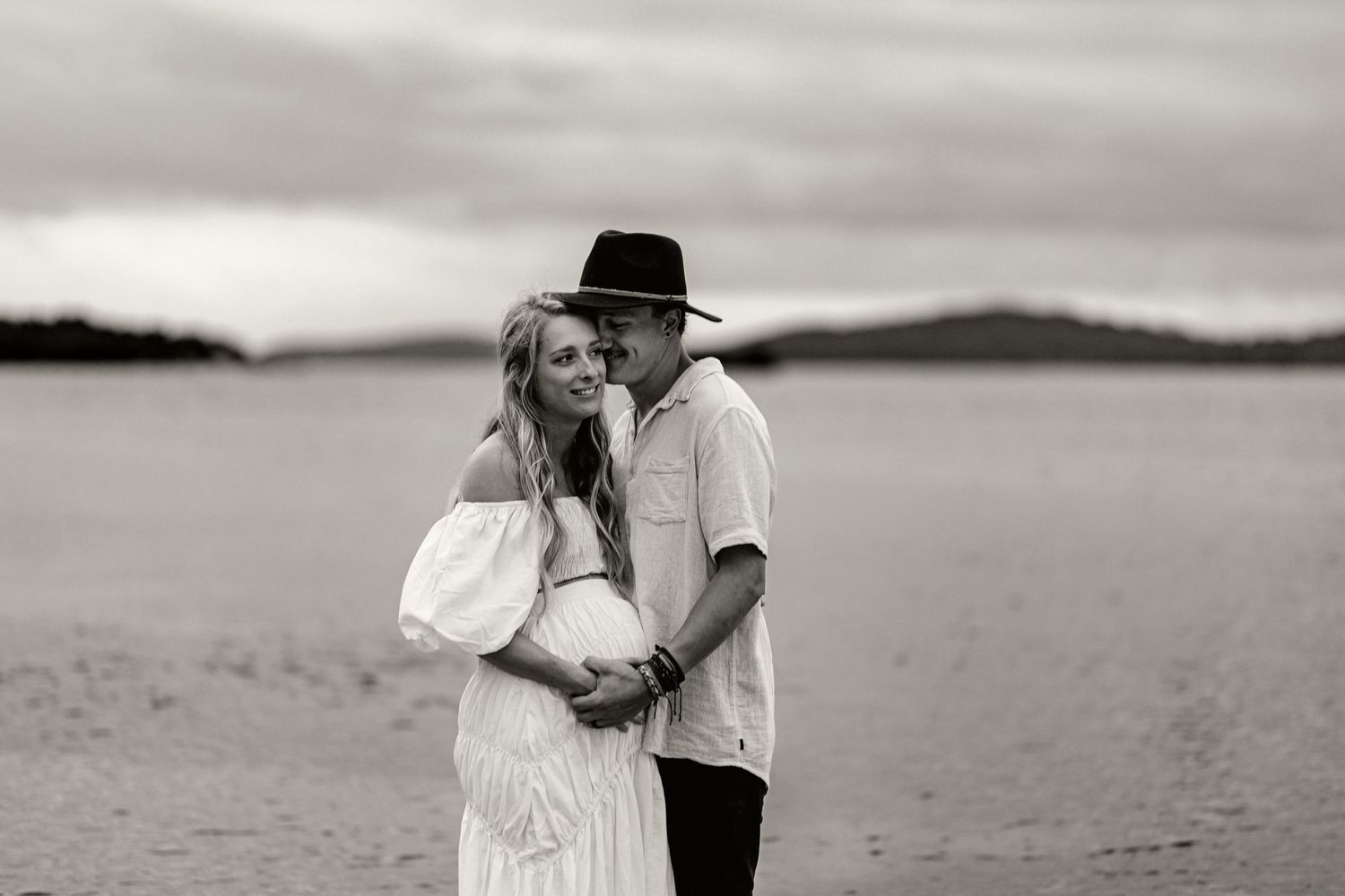 Couple Maternity Photoshoot at sunset on the beach, Lake Macquarie, Newcastle, Hunter Valley, New South Wales