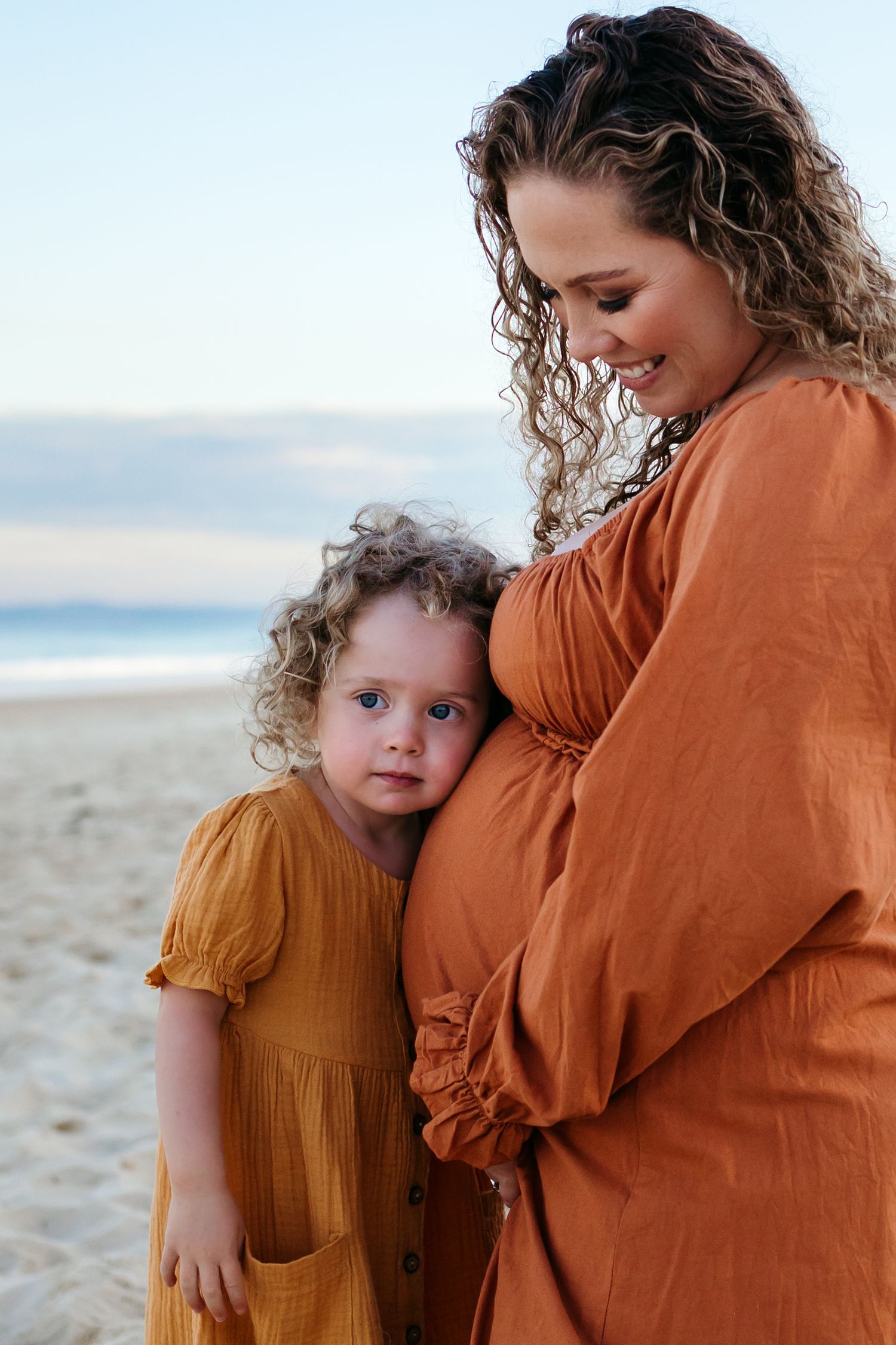 Pregnant Family Maternity Photoshoot at sunrise on the beach, Lake Macquarie, Newcastle, Hunter Valley, New South Wales