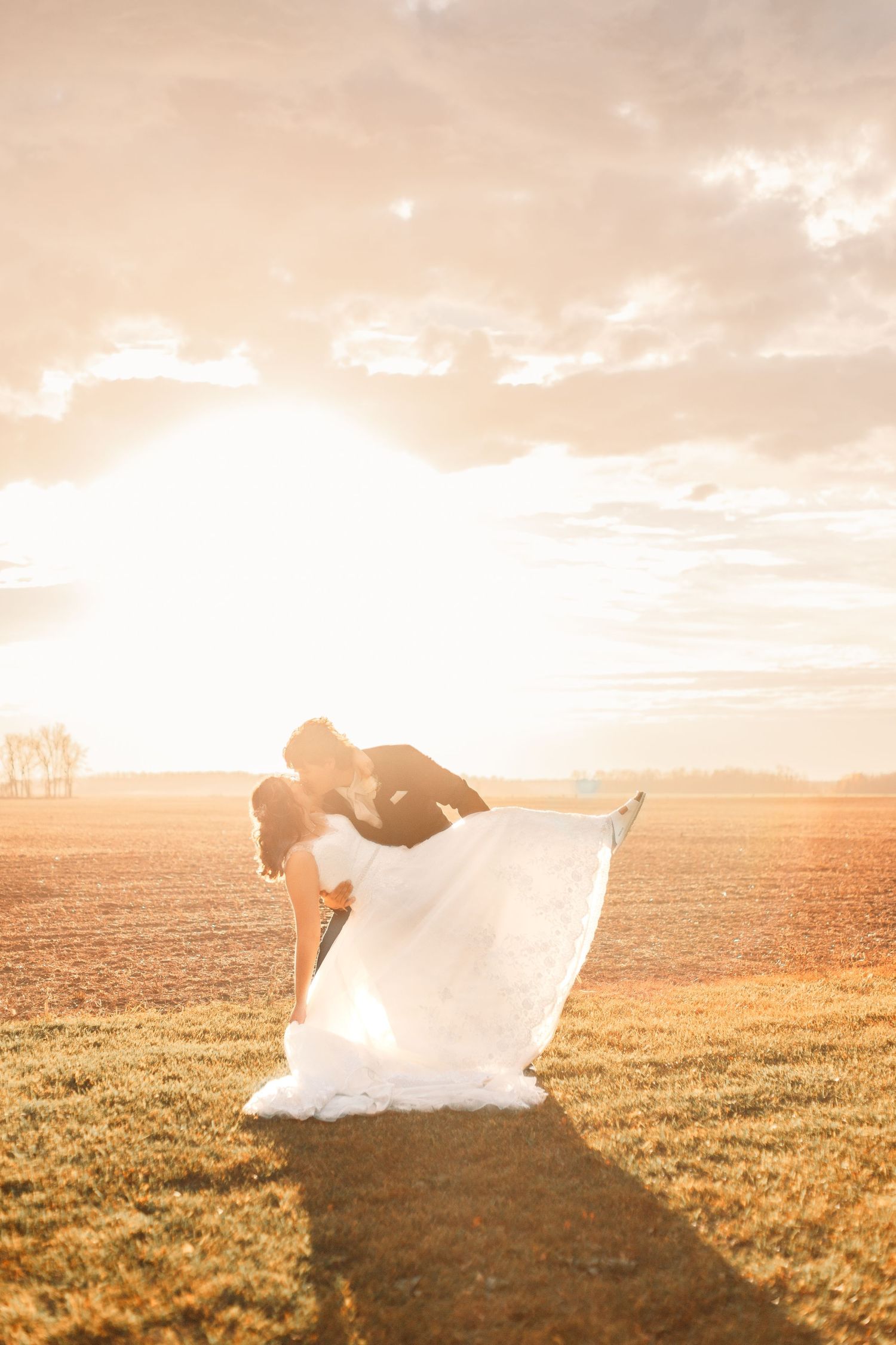 White bridal wedding dress at sunset with fairytale vibes and timeless photography style in Norfolk Ontario
