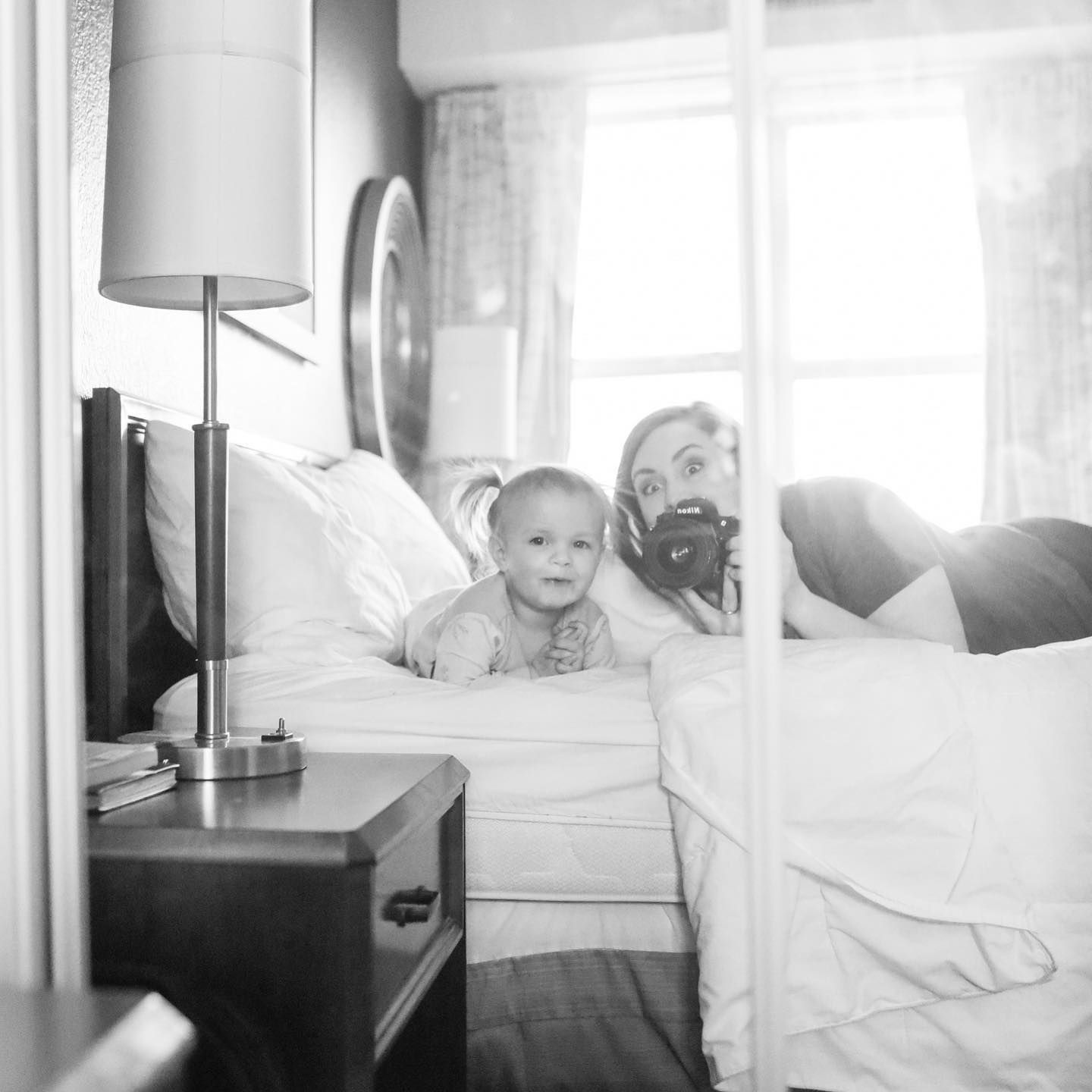 Black and white photos of morning light streaming through windows into a bright bedroom.