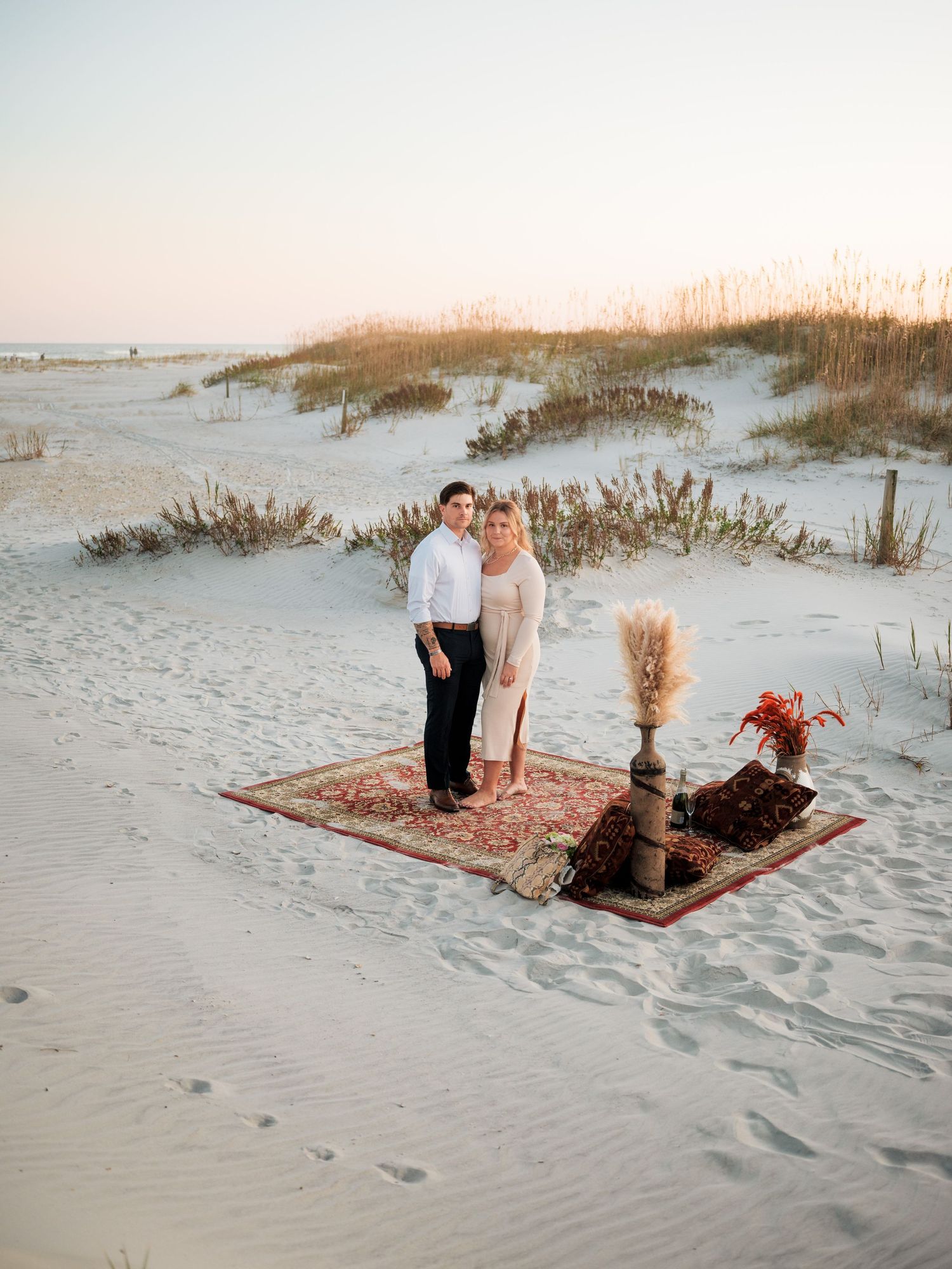 couples propose on the beach